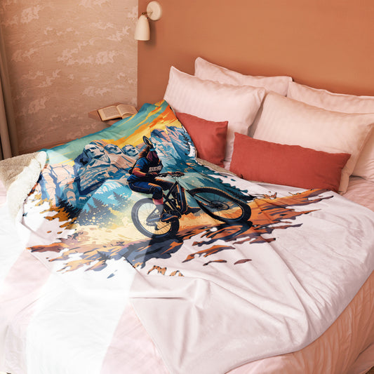 Bed with a colorful mountain bike design on a white comforter
