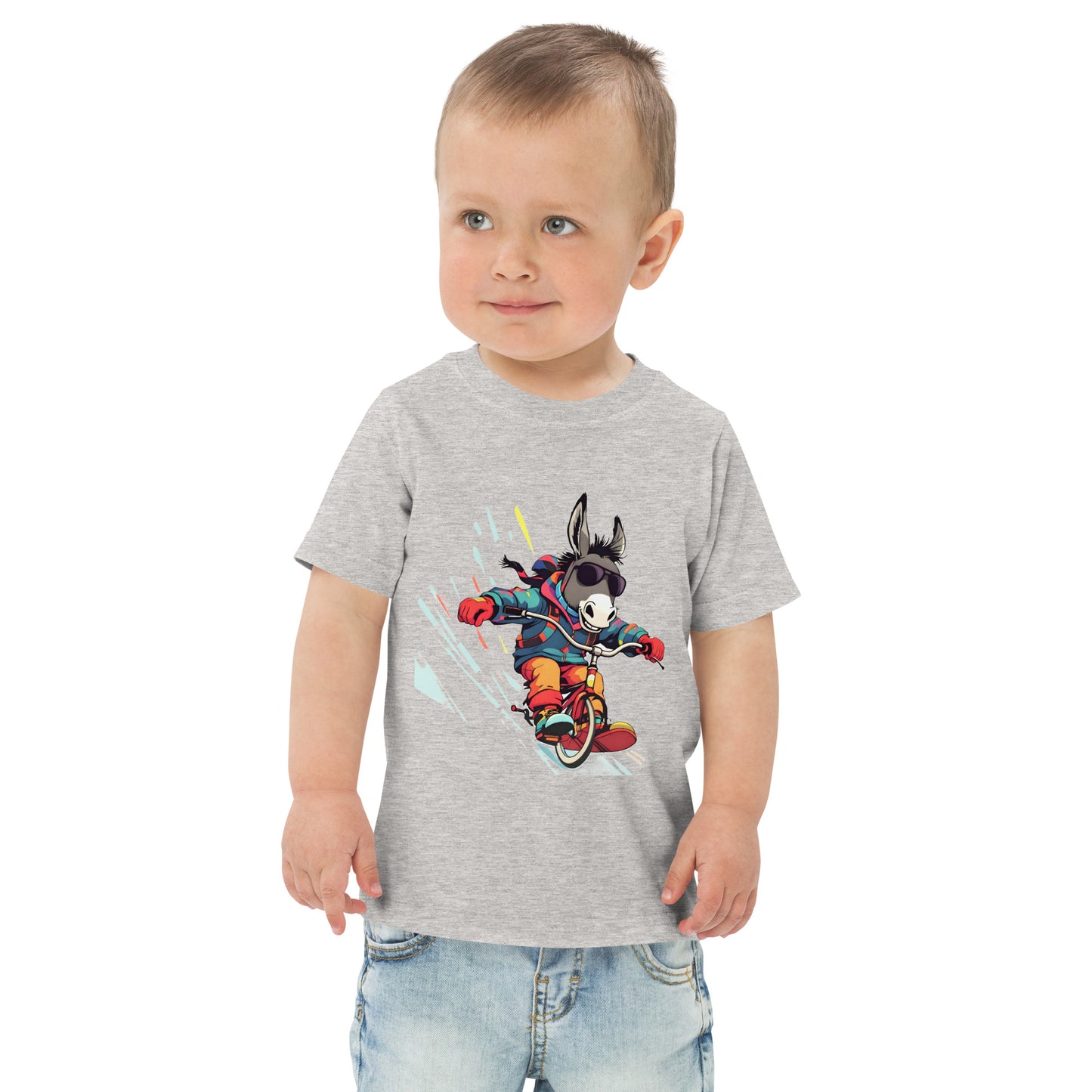 Child wearing a gray t-shirt with a cartoon character on a white background