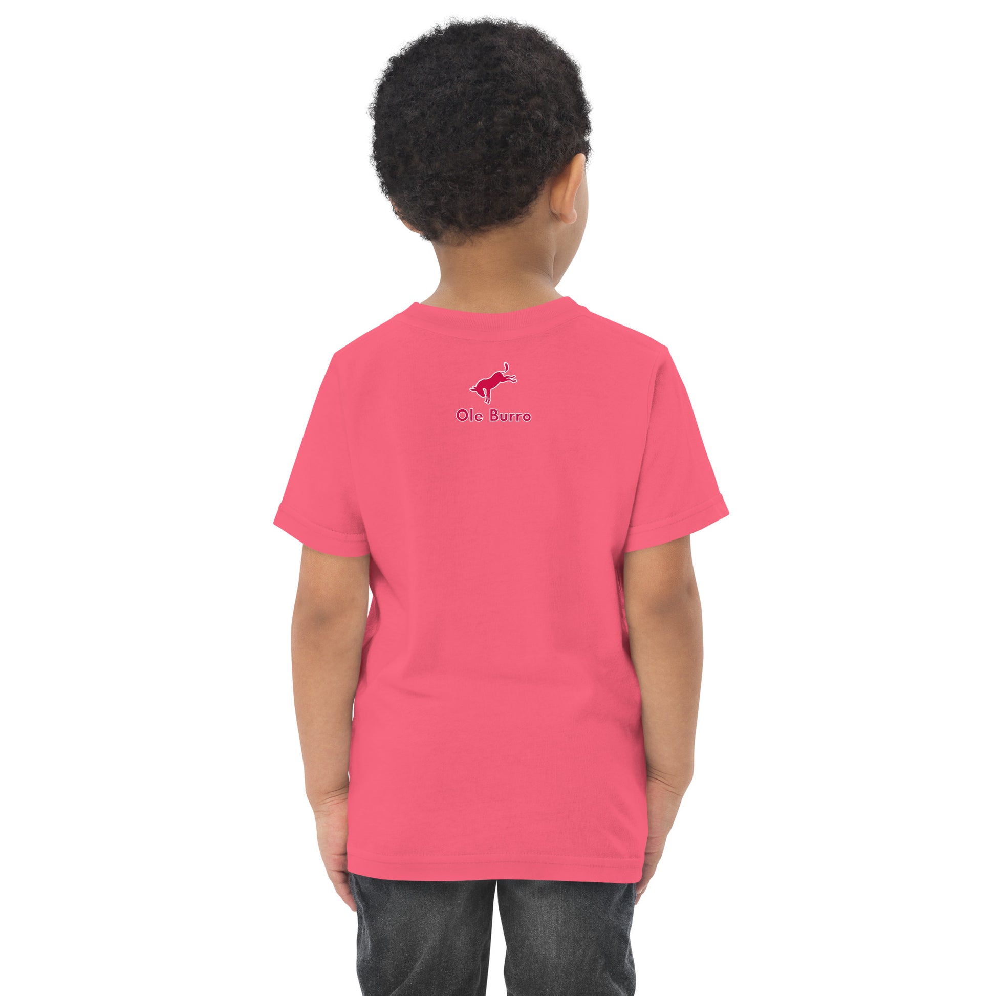 Child wearing a pink t-shirt with a logo on the back against a white background