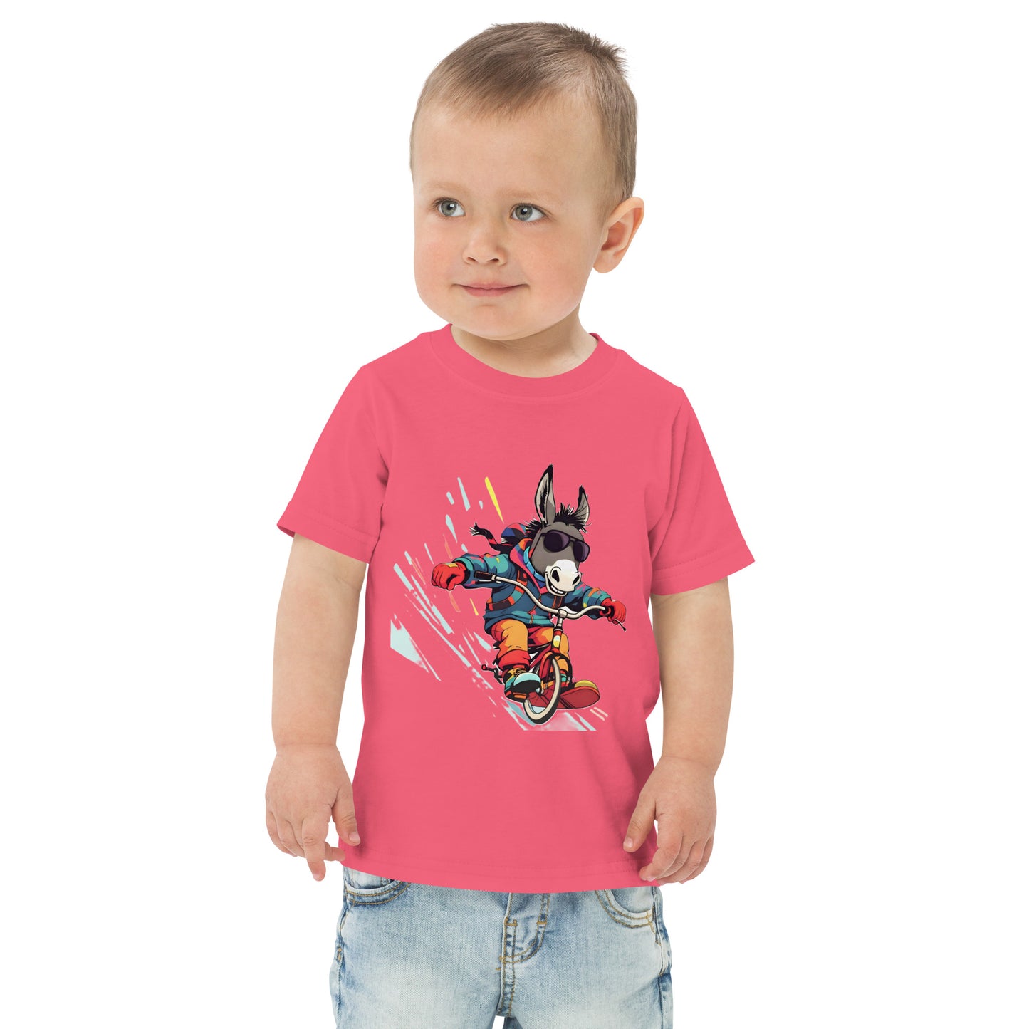Child wearing a pink t-shirt with a donkey on a bike graphic