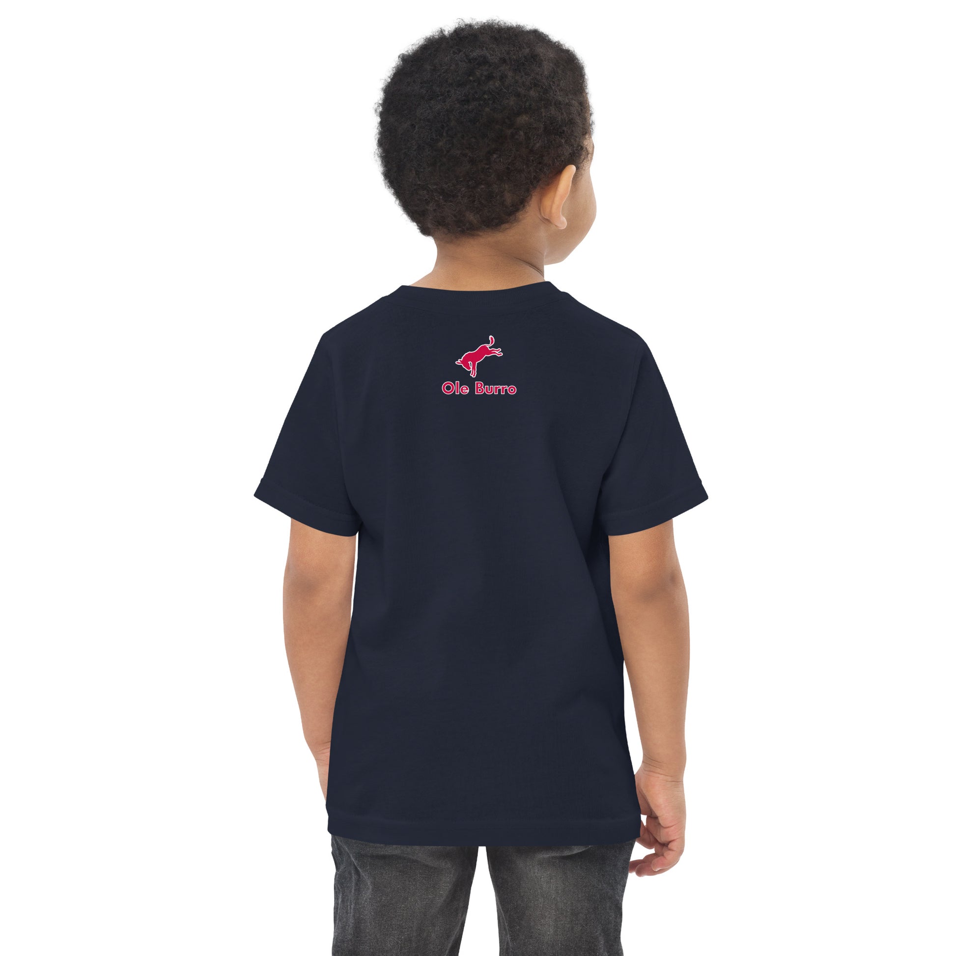 Child wearing a navy blue t-shirt with a logo on the back against a white background