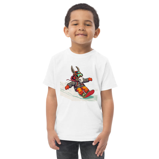 Child wearing a white t-shirt with a cartoon character on a white background