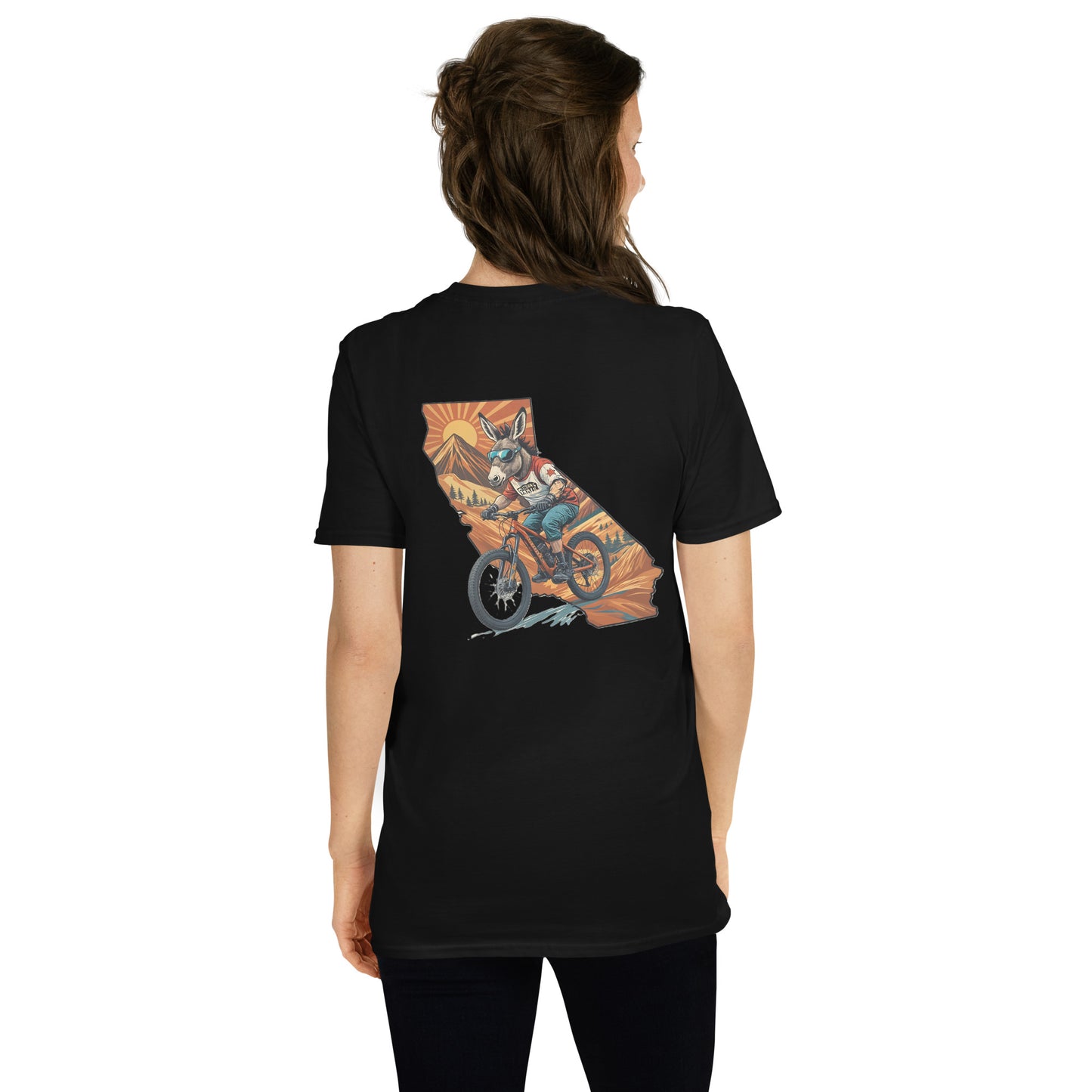 Person wearing a black t-shirt with a colorful graphic on the back, standing against a white background