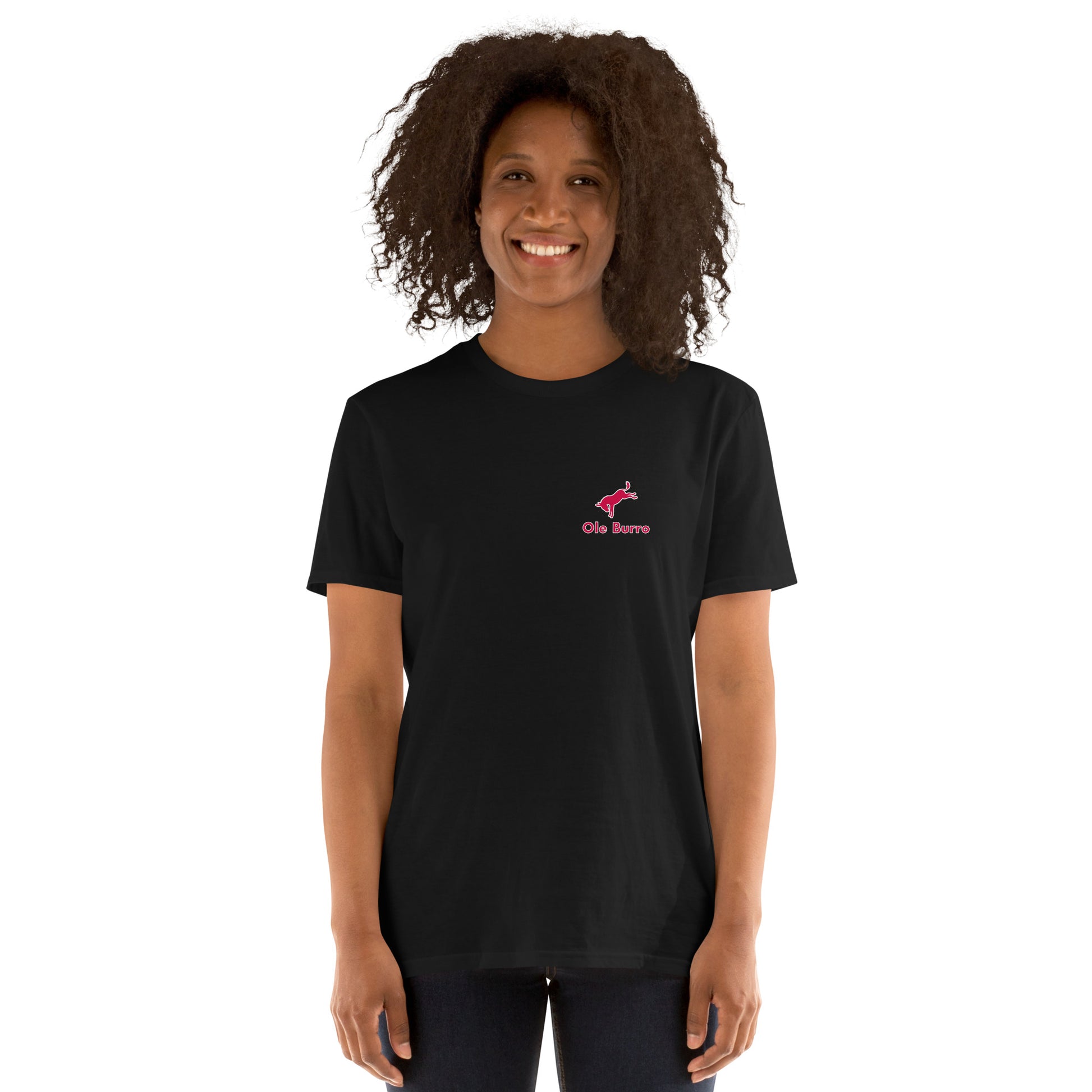 Person wearing a black t-shirt with a pink logo on a white background