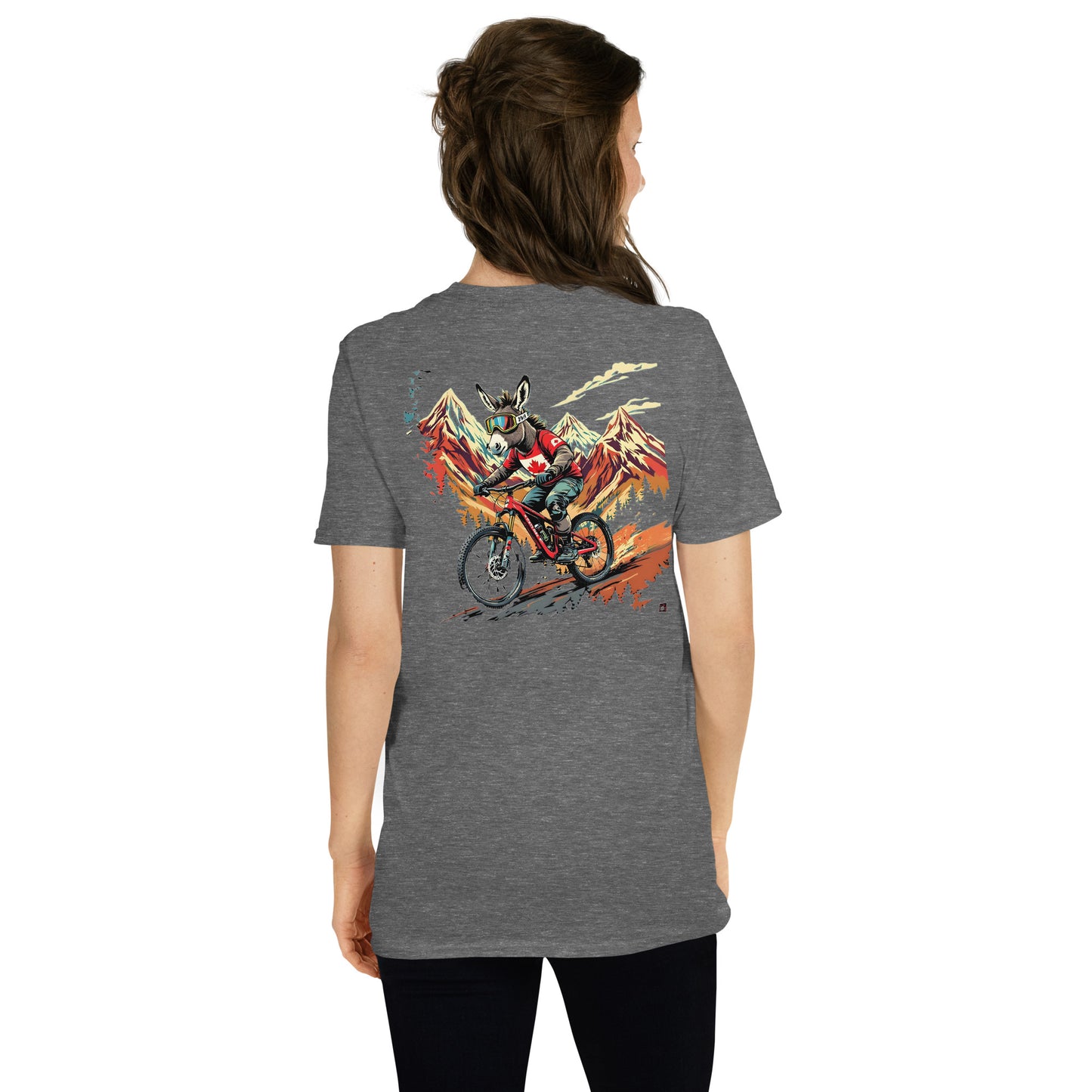 Person wearing a gray t-shirt with a colorful graphic on the back