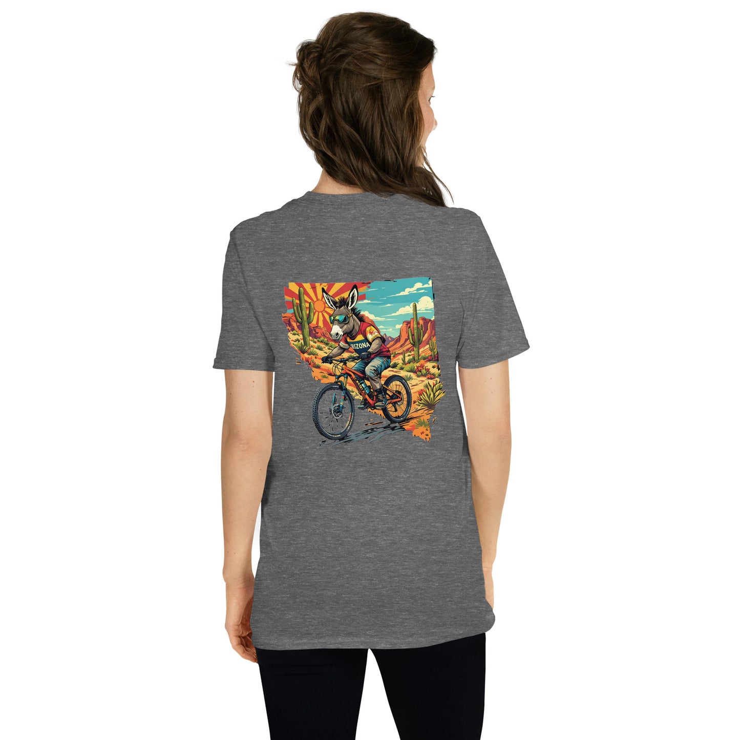 Person wearing a gray t-shirt with a colorful graphic on the back, standing against a white background