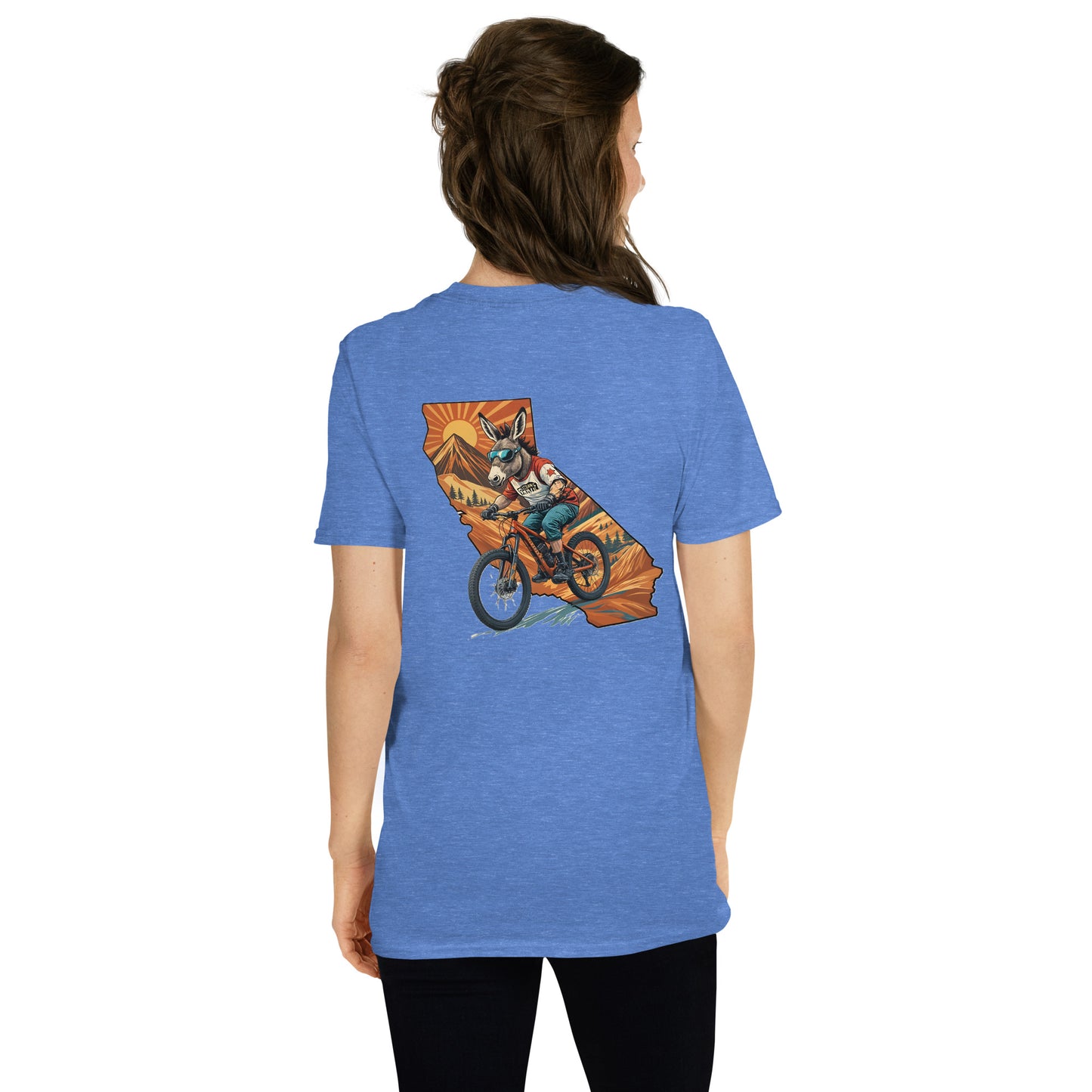 Person wearing a blue t-shirt with a graphic design on the back, standing against a white background