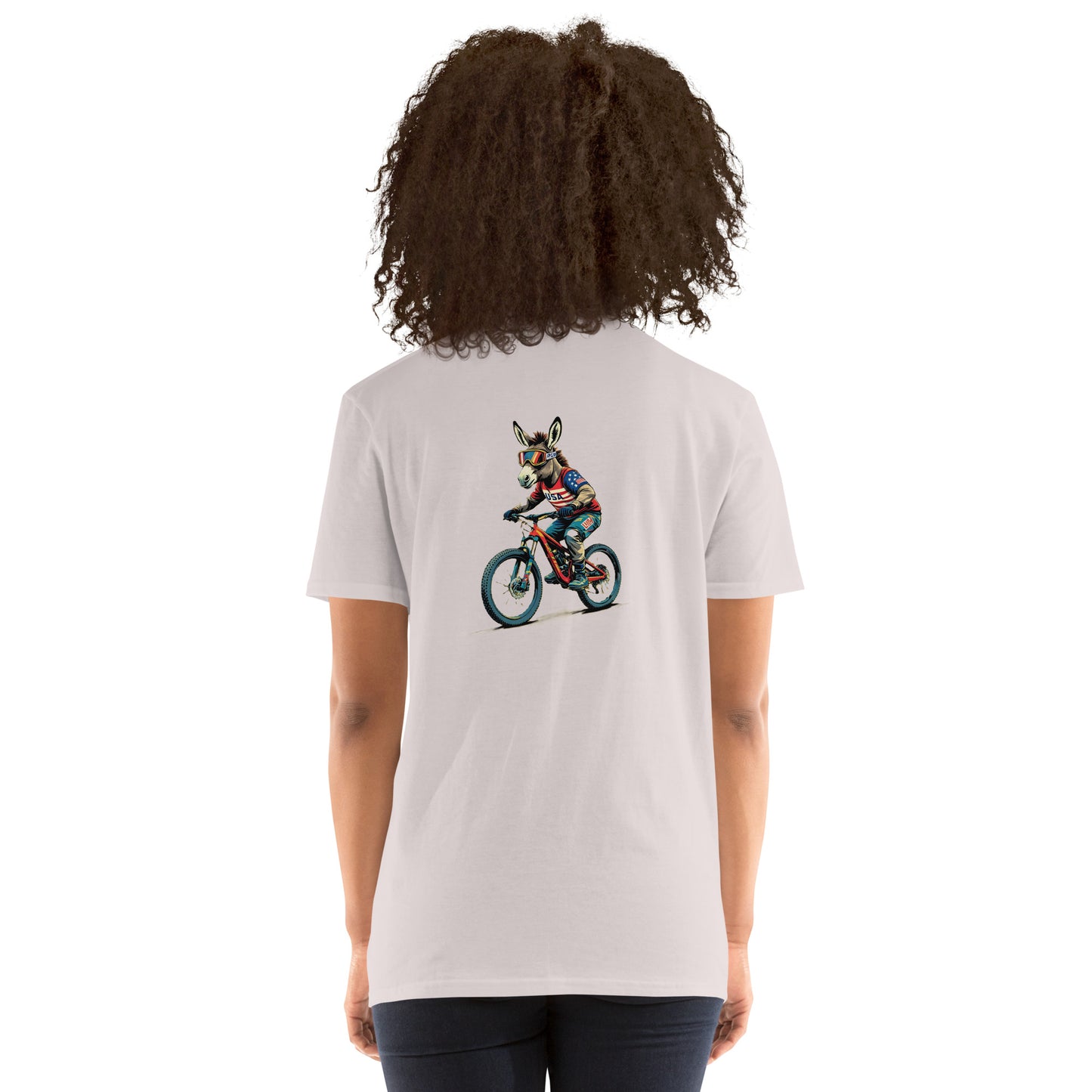 Person wearing a white t-shirt with a graphic of a person on a bike on the back, on a white background