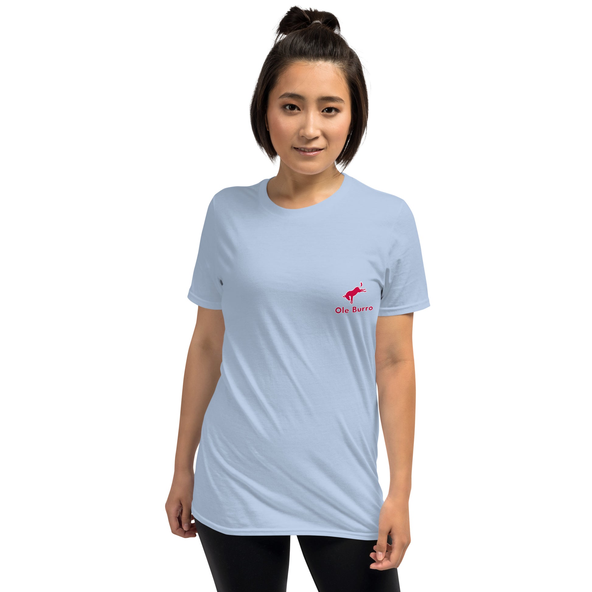 Woman wearing a light blue t-shirt with a red logo on a white background