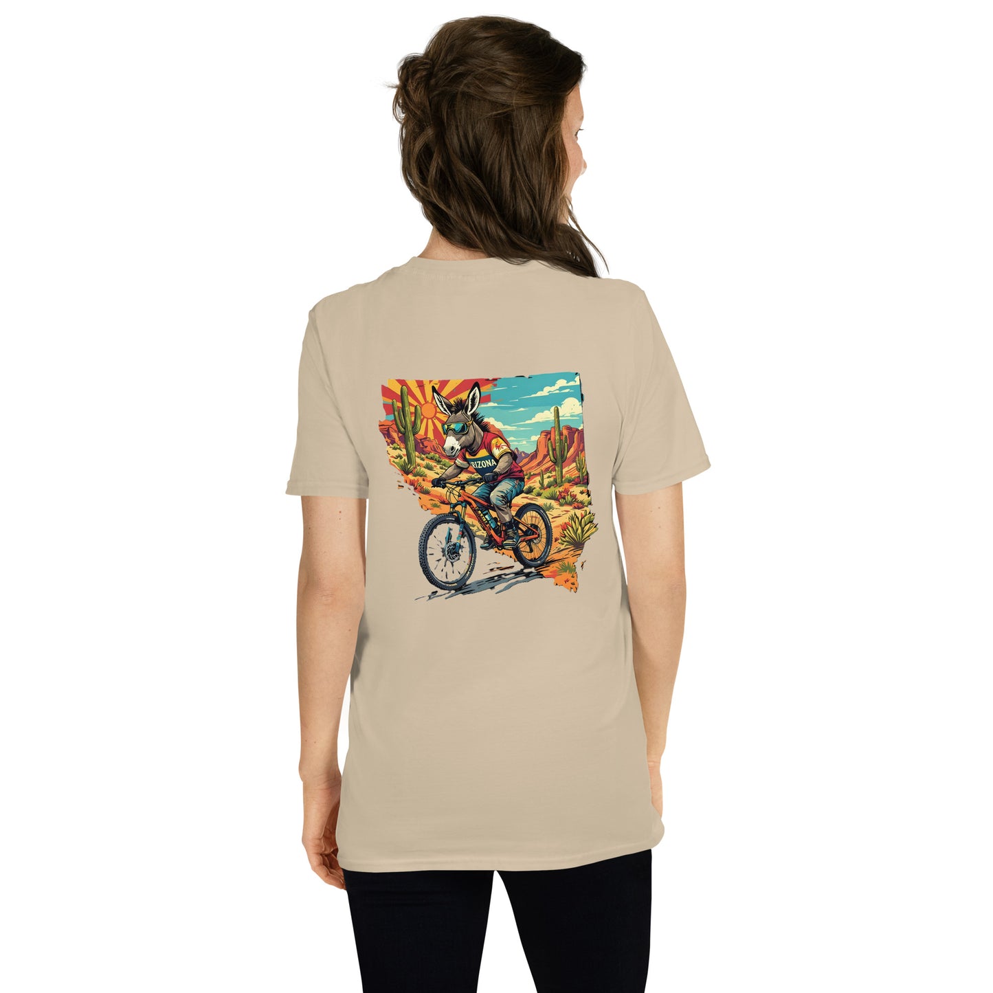 Person wearing a beige t-shirt with a colorful graphic on the back