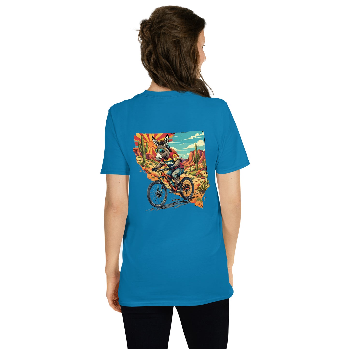 Person wearing a blue t-shirt with a colorful graphic on the back, standing against a white background