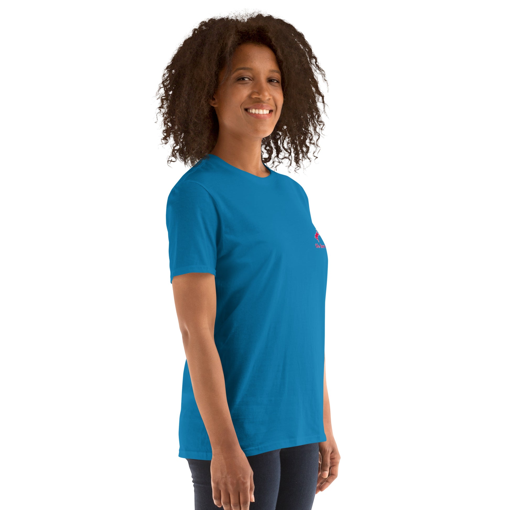 Person wearing a blue t-shirt with a logo on a white background