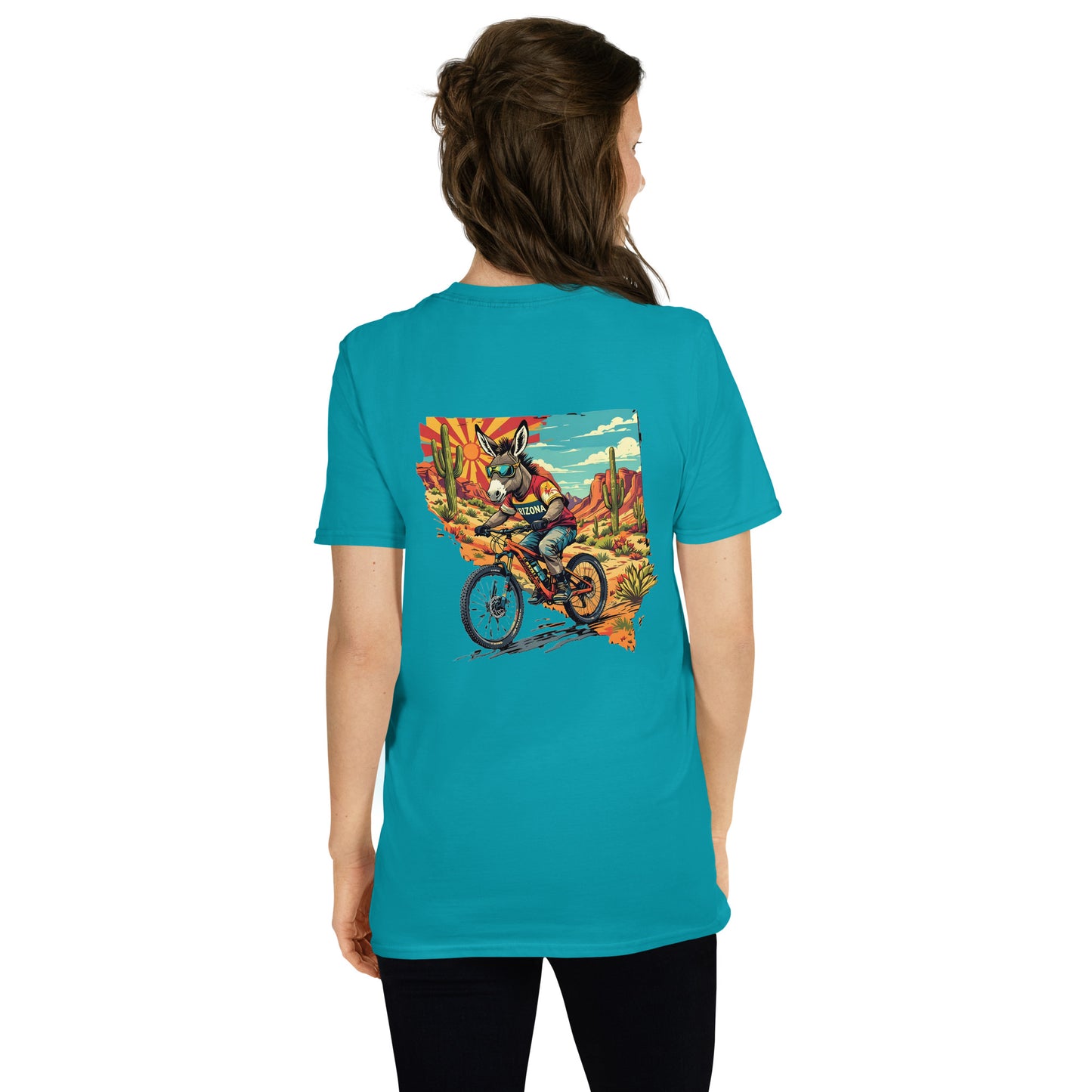Person wearing a turquoise t-shirt with a colorful graphic on the back, standing against a white background.