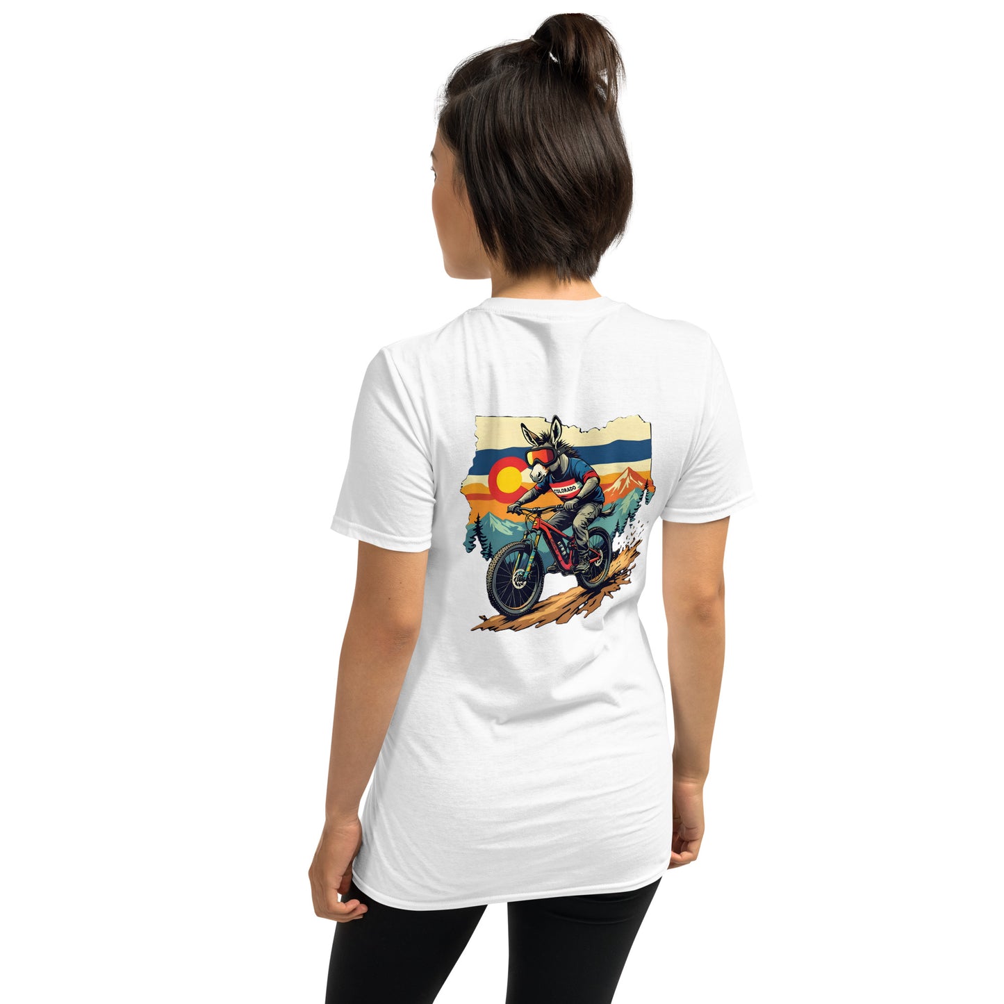 Person wearing a white t-shirt with a graphic of a motorcycle and sunset on the back
