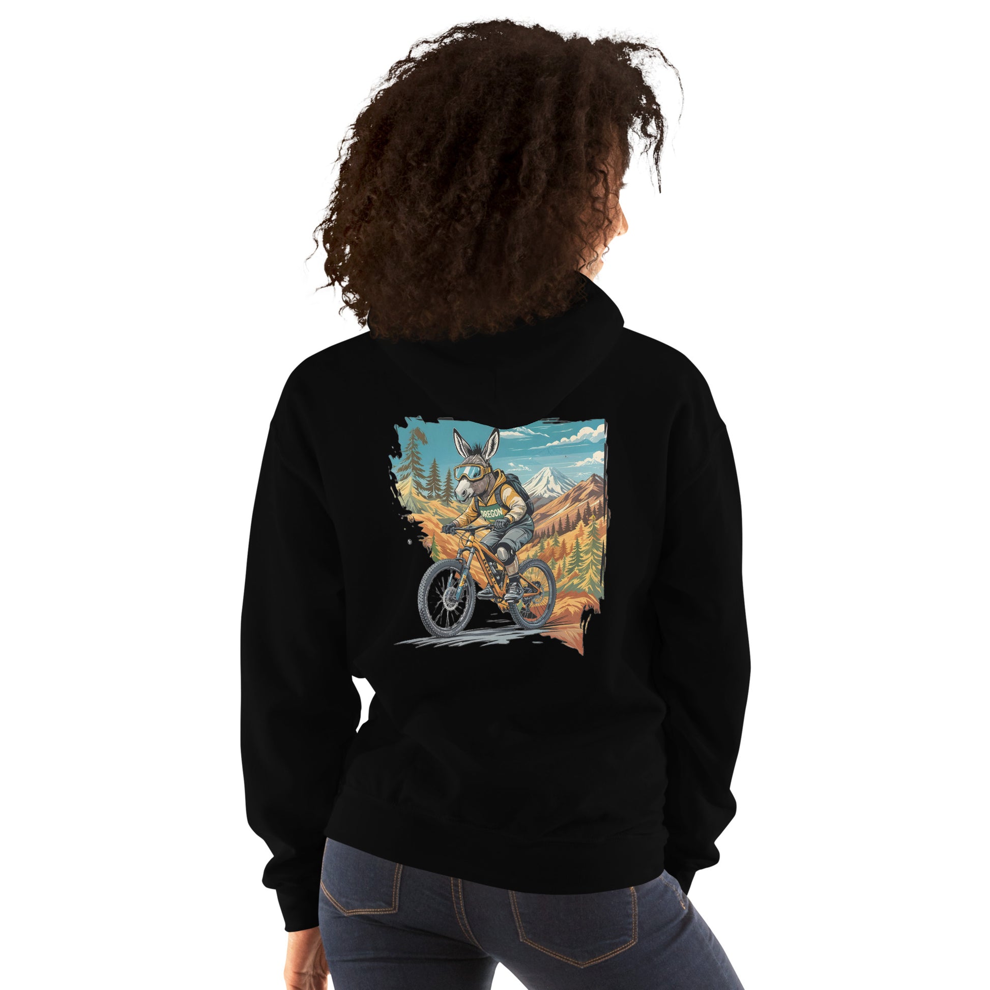 Person wearing a black hoodie with a colorful graphic on the back, standing against a white background