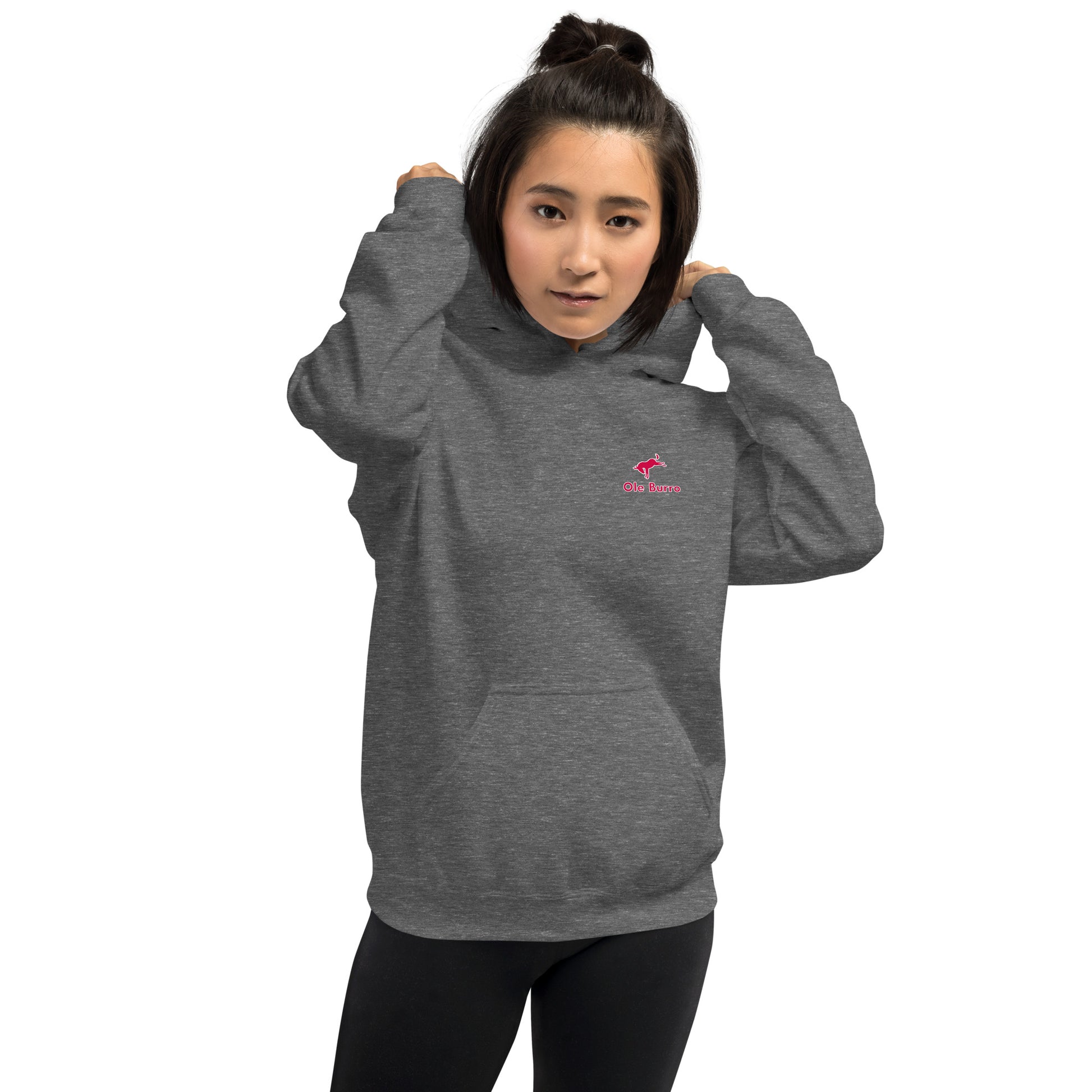 Person wearing a gray hoodie with a pink logo on a white background
