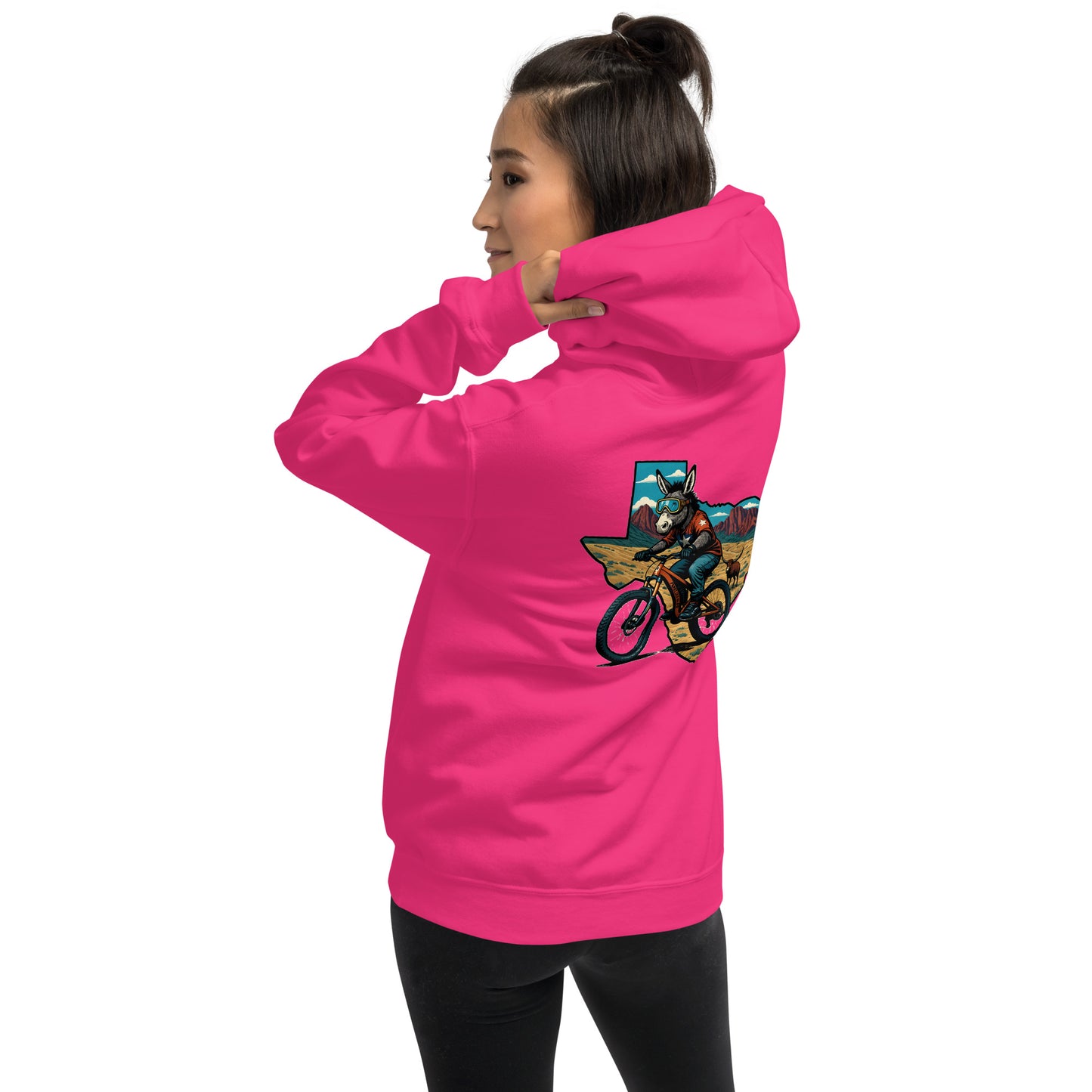 Person wearing a bright pink hoodie with a colorful graphic on the back, on a white background