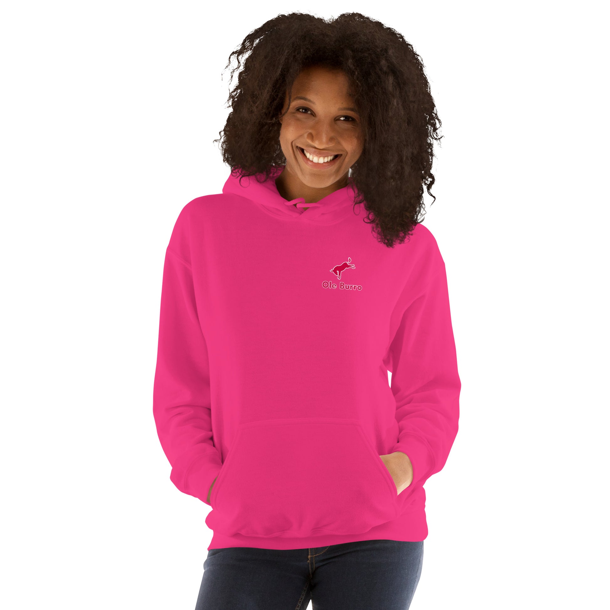 Person wearing a bright pink hoodie with a logo on a white background