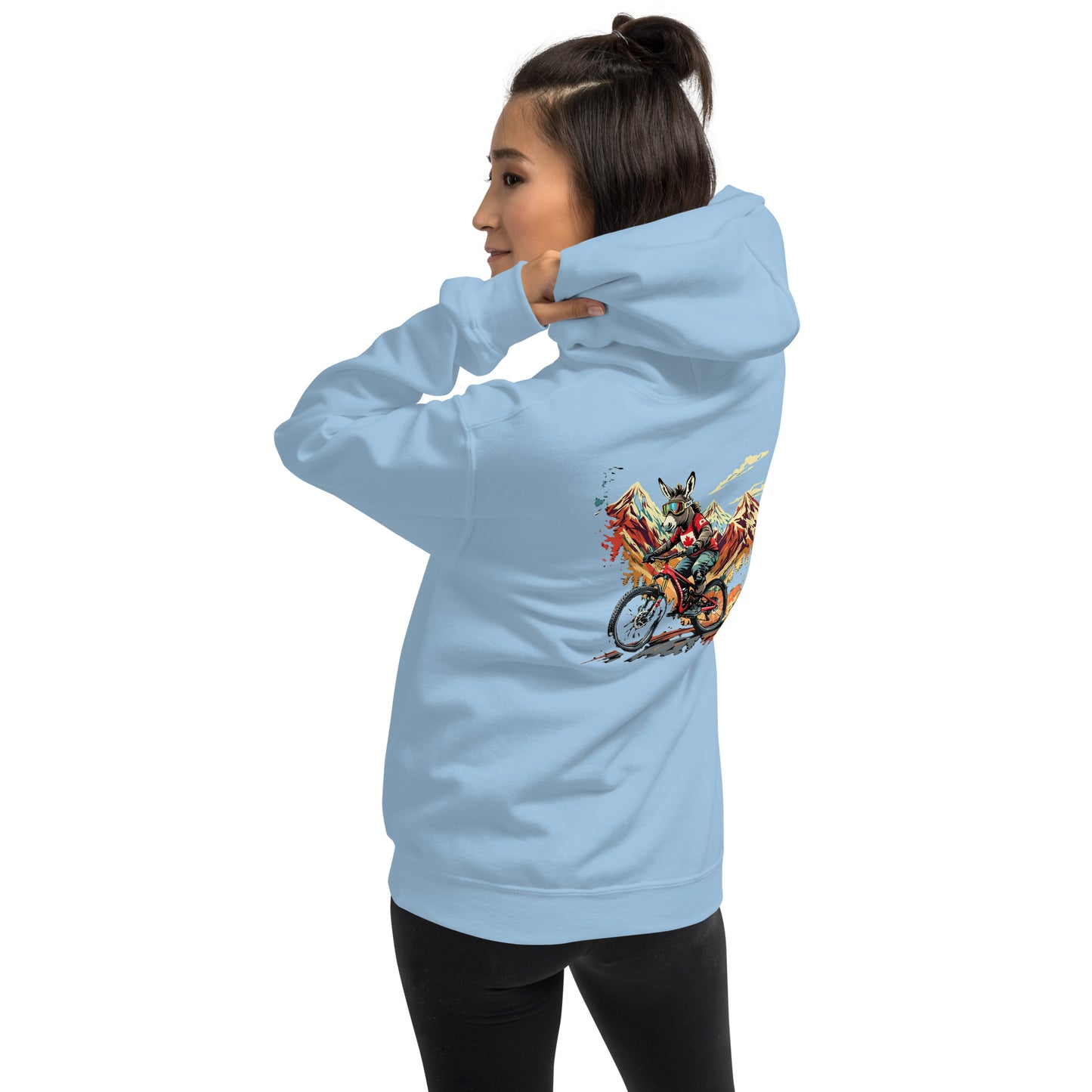 Light blue hoodie with a colorful graphic on the back, worn by a person.