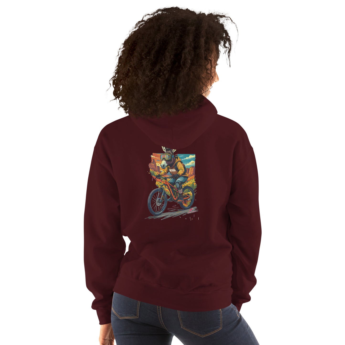 Person wearing a maroon hoodie with a colorful graphic on the back, standing against a white background