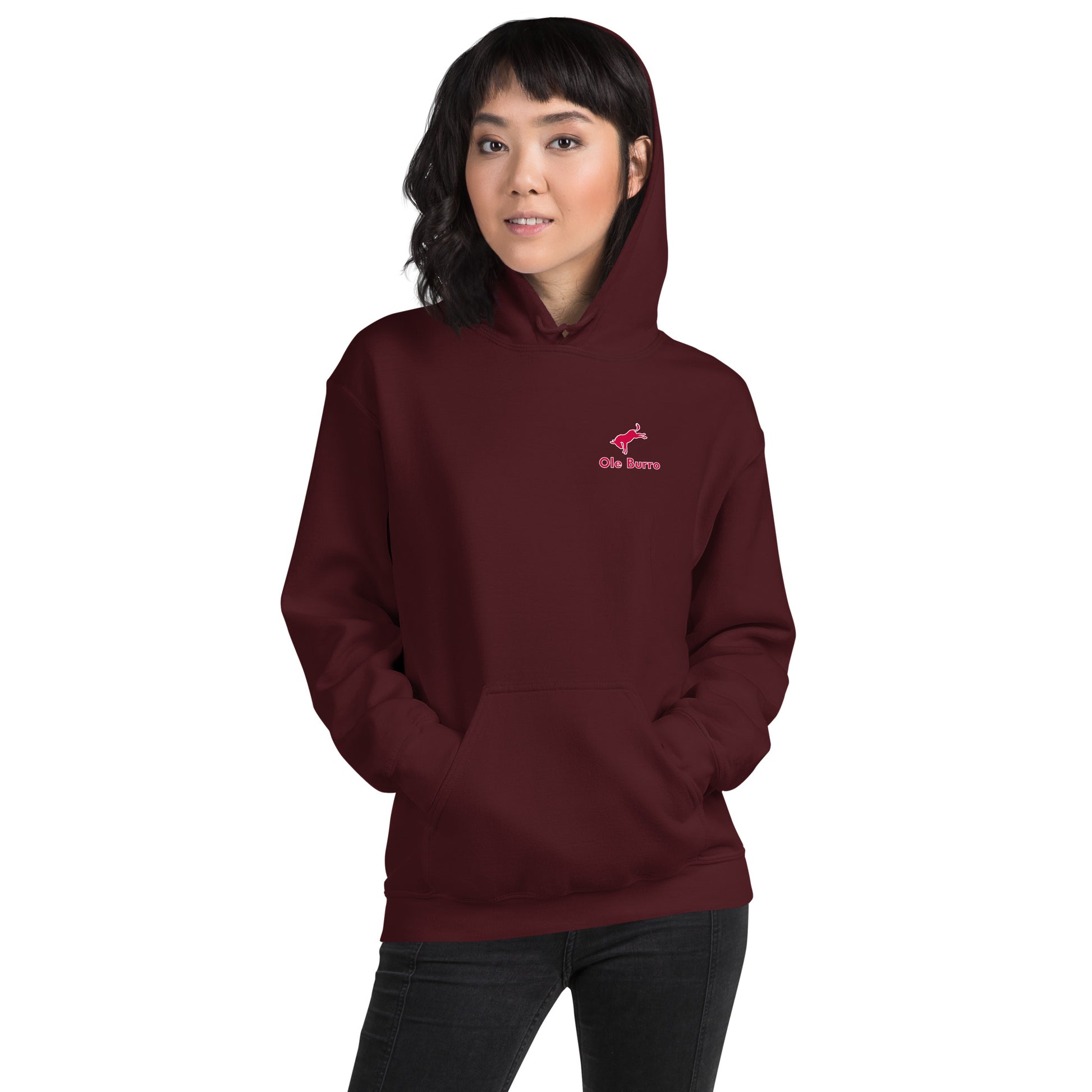 Person wearing a maroon hoodie with a logo on a white background