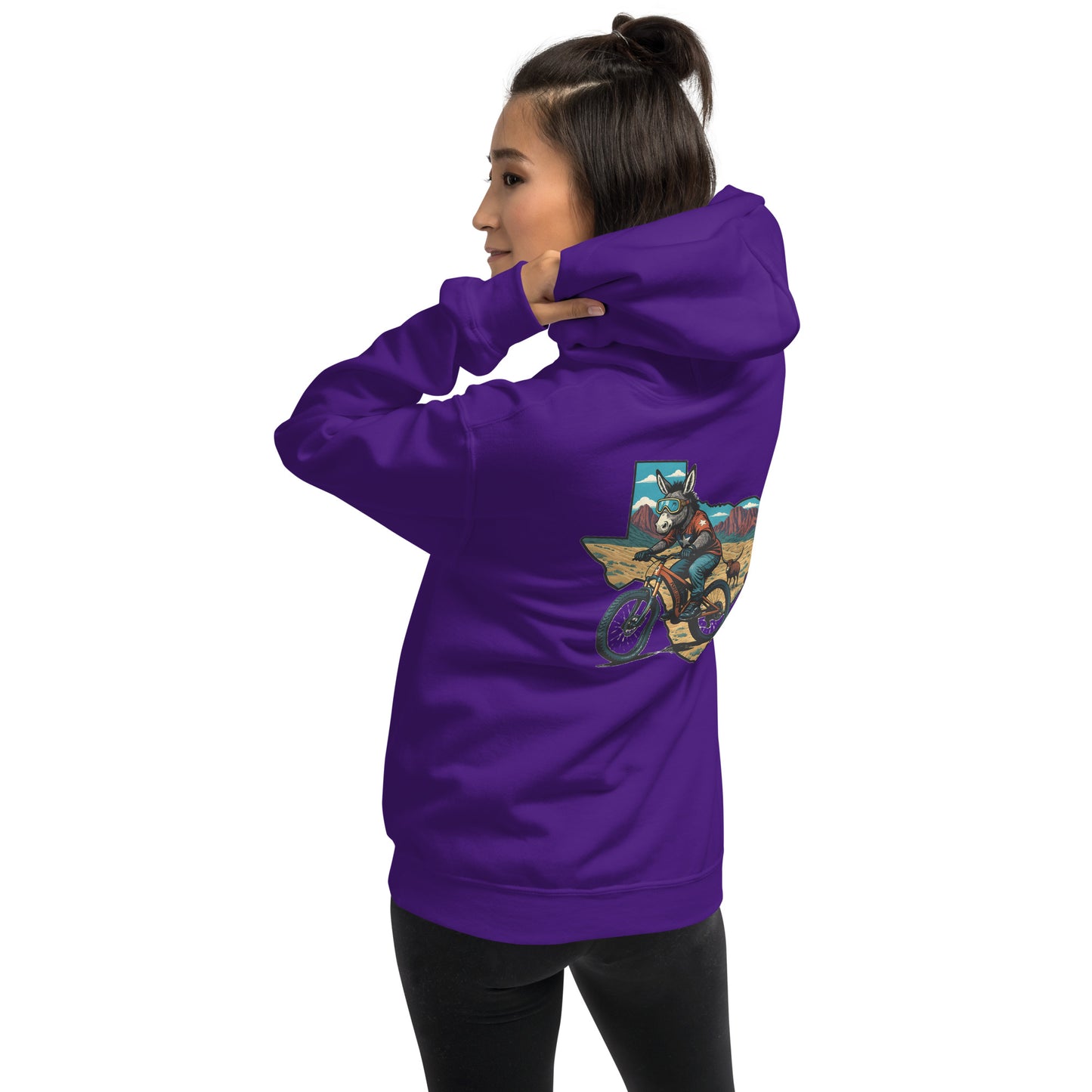 Person wearing a purple hoodie with a graphic design on the back