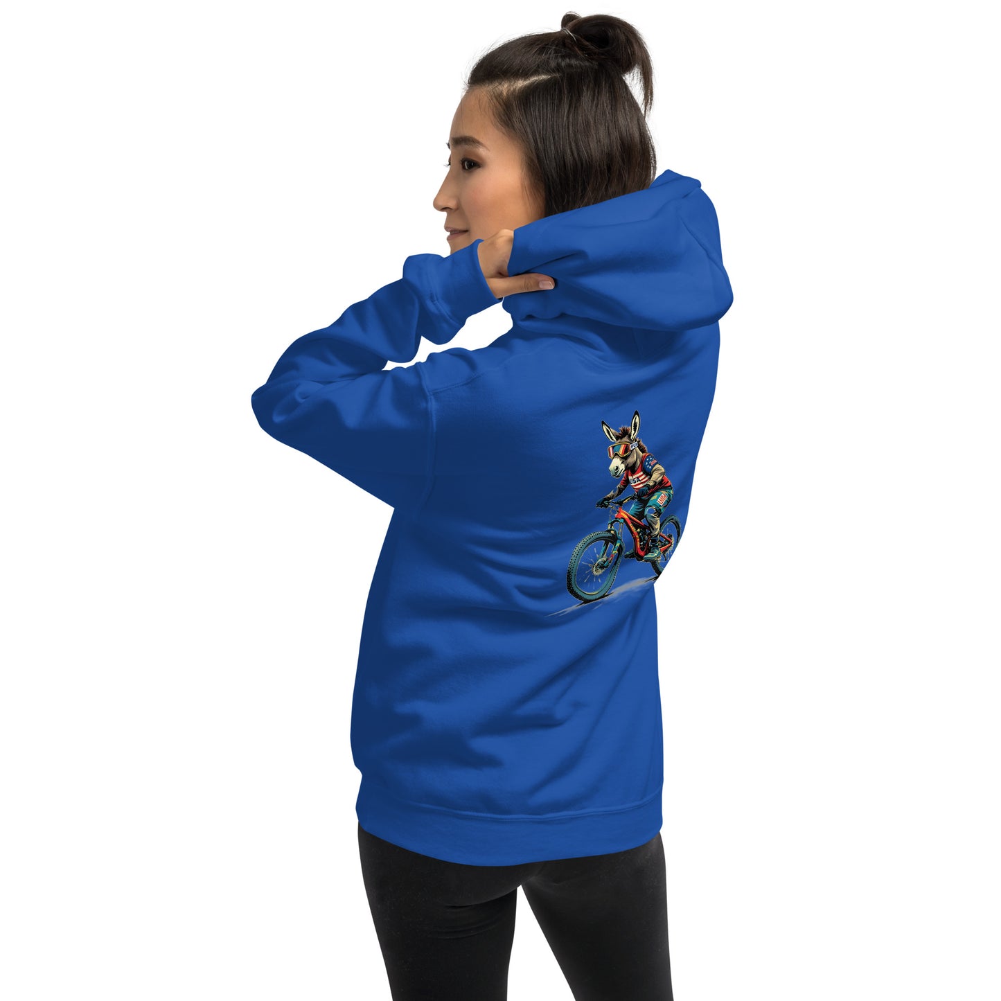 Person wearing a blue hoodie with a graphic design on the back against a white background