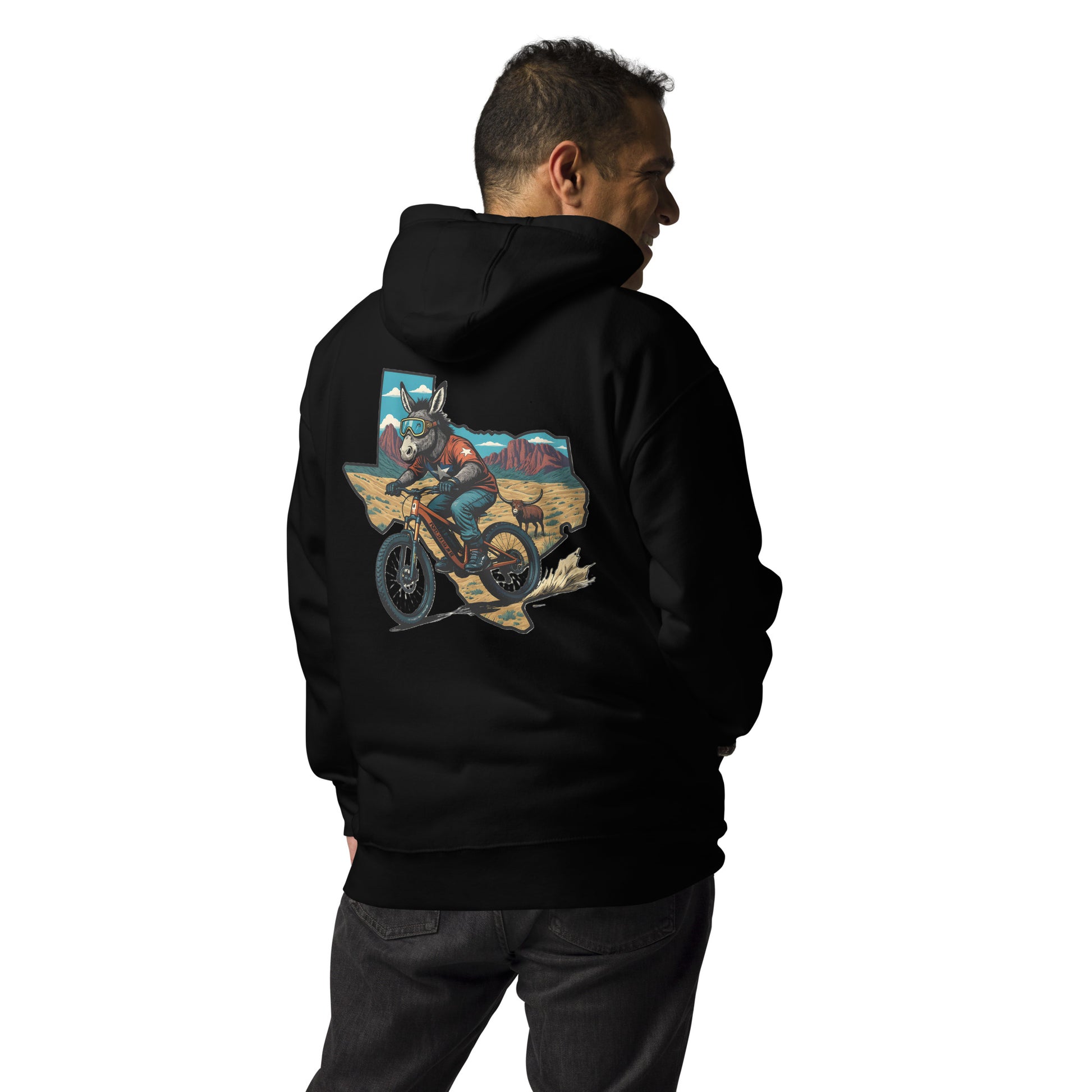 Person wearing a black hoodie with a colorful graphic on the back, standing against a white background