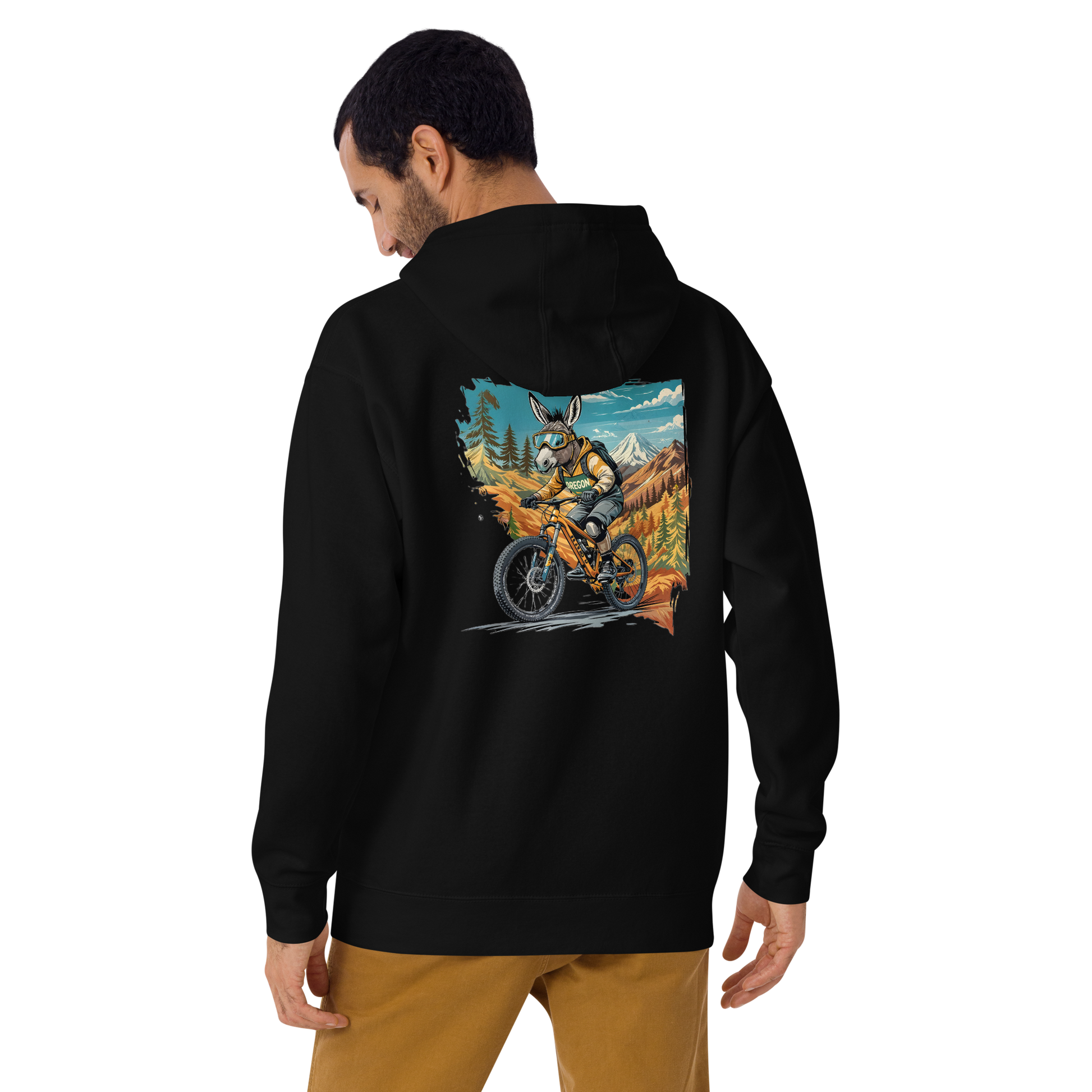Person wearing a black hoodie with a colorful graphic on the back, standing against a white background