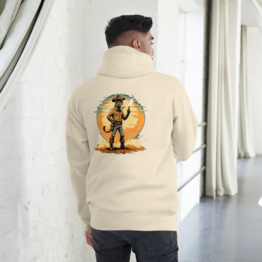 Person wearing a beige hoodie with a graphic design on the back, standing in a room with white walls and a gray floor.