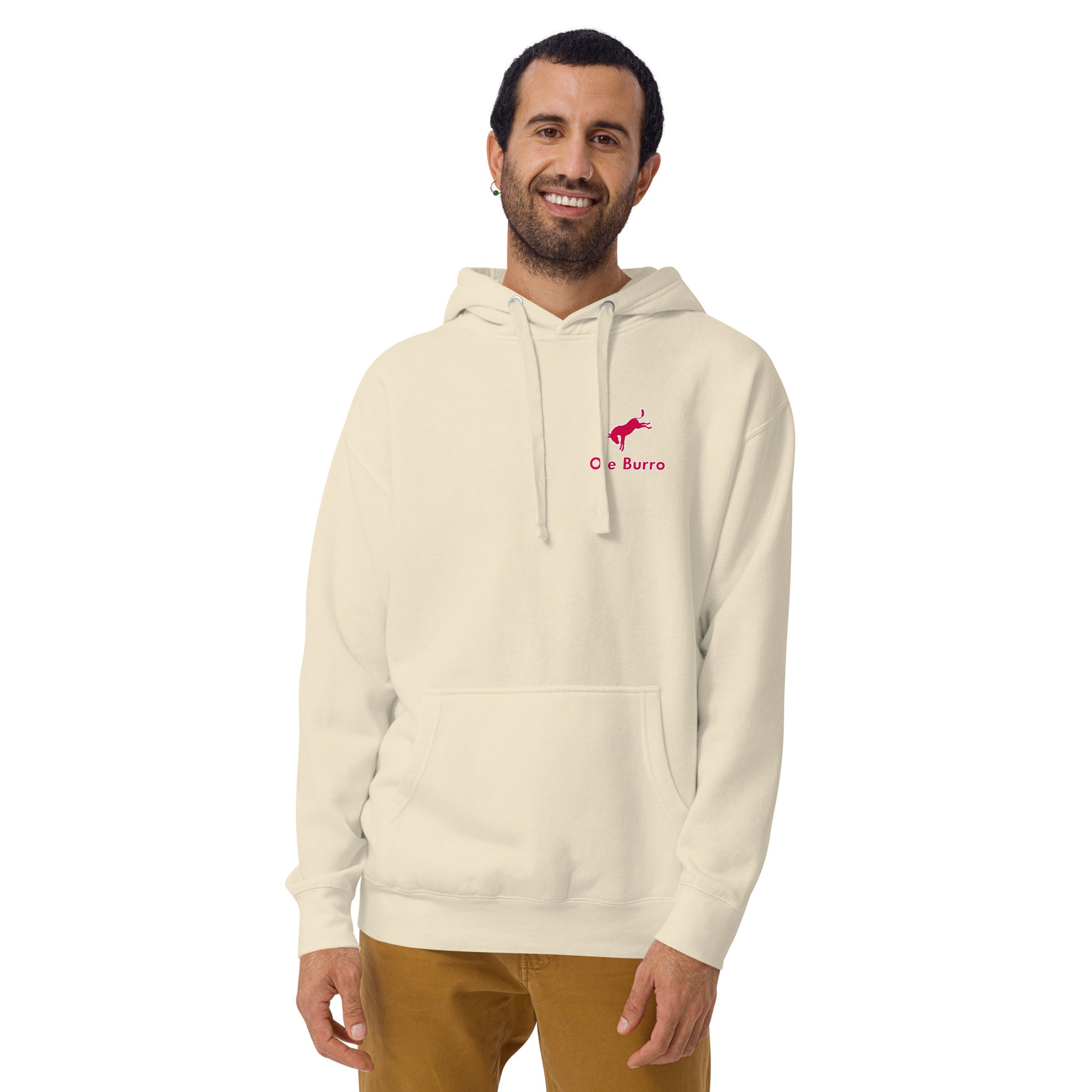 Man wearing a beige hoodie with a logo on a white background