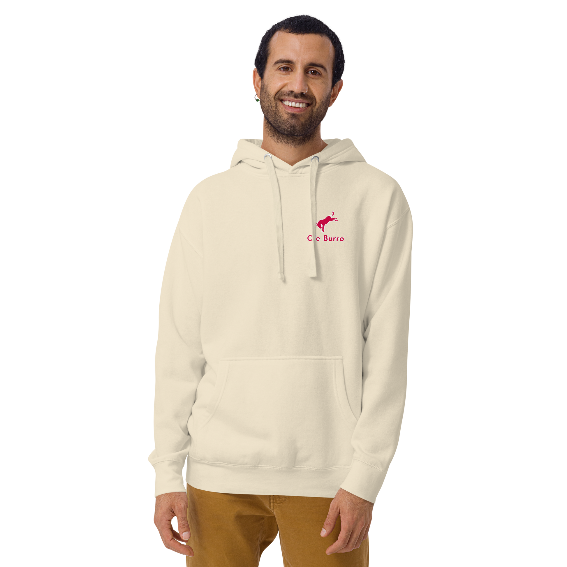 Man wearing a beige hoodie with a logo on a white background