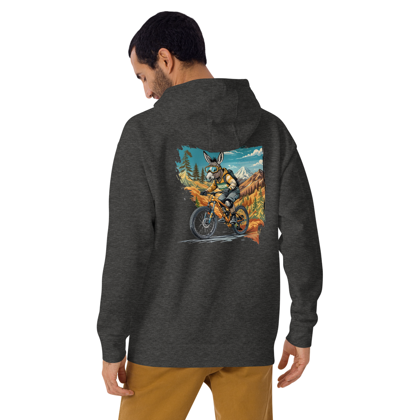 Person wearing a dark gray hoodie with a colorful graphic on the back, standing against a white background.