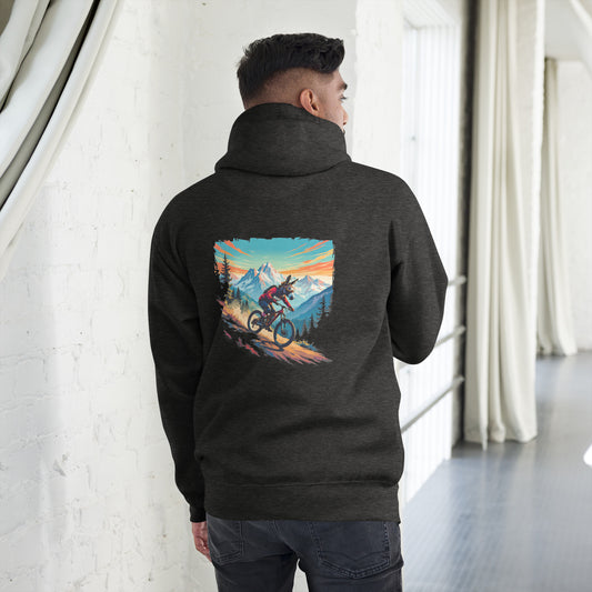 Person wearing a black hoodie with a mountain bike graphic on the back, standing in a room with white walls and curtains.