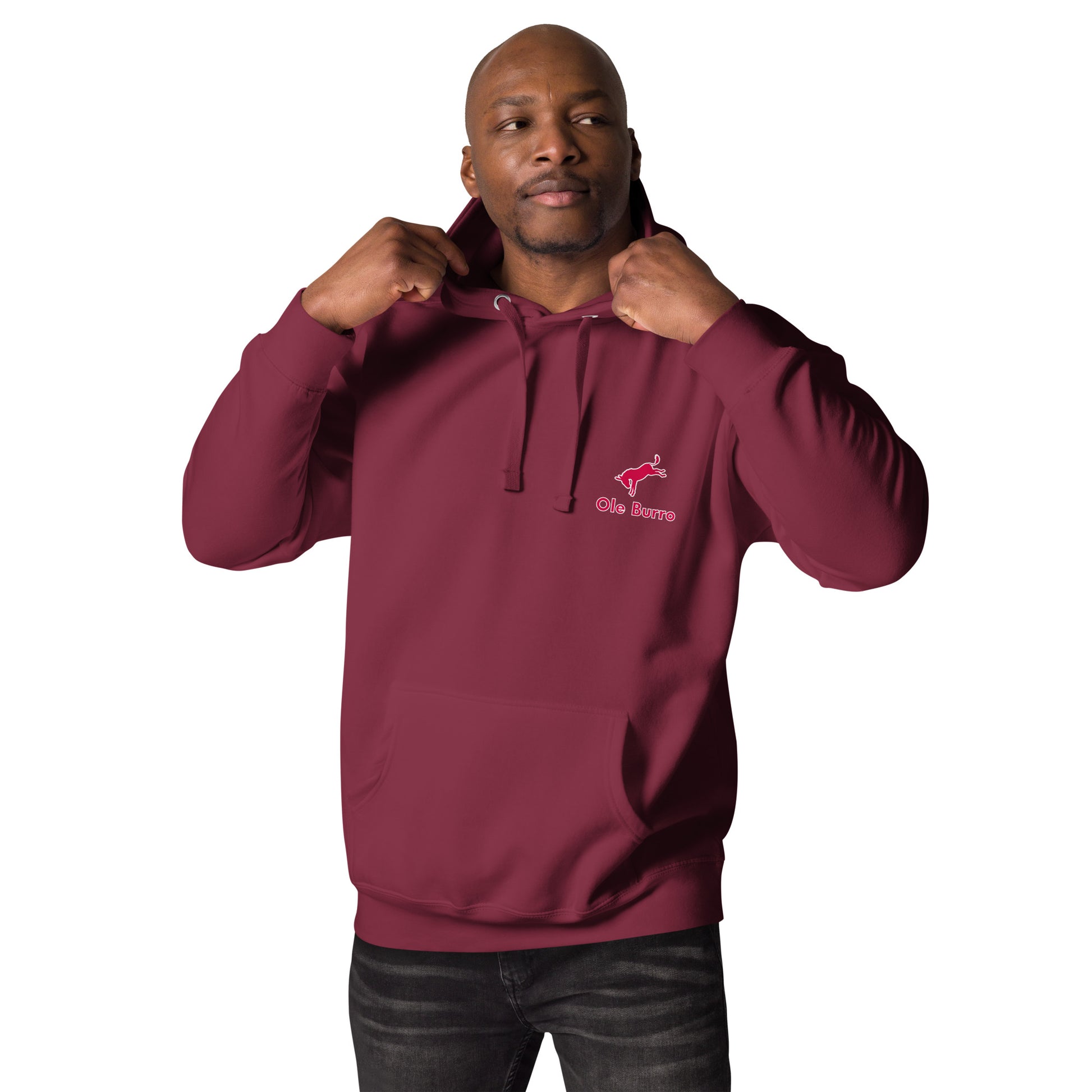 Man wearing a maroon hoodie with a logo on a white background