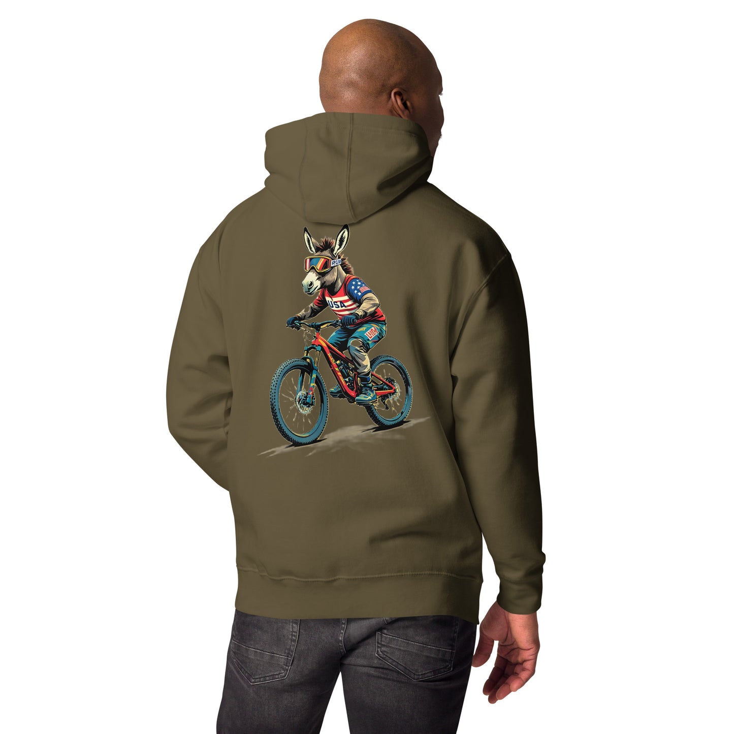 Person wearing a green hoodie with a graphic of a dog on a bike on the back, on a white background