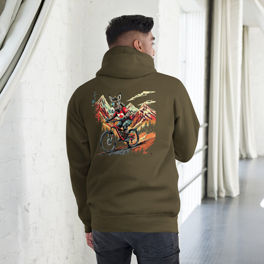 Person wearing a green hoodie with a colorful graphic on the back, standing in a room with white walls and curtains.
