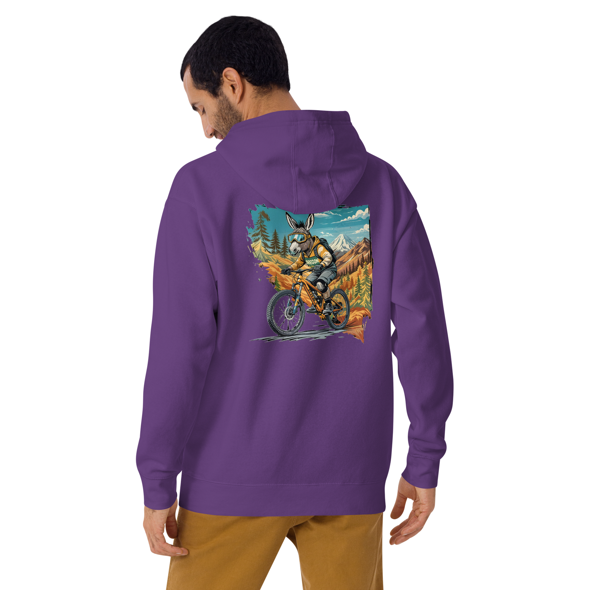 Person wearing a purple hoodie with a colorful graphic on the back, standing against a white background