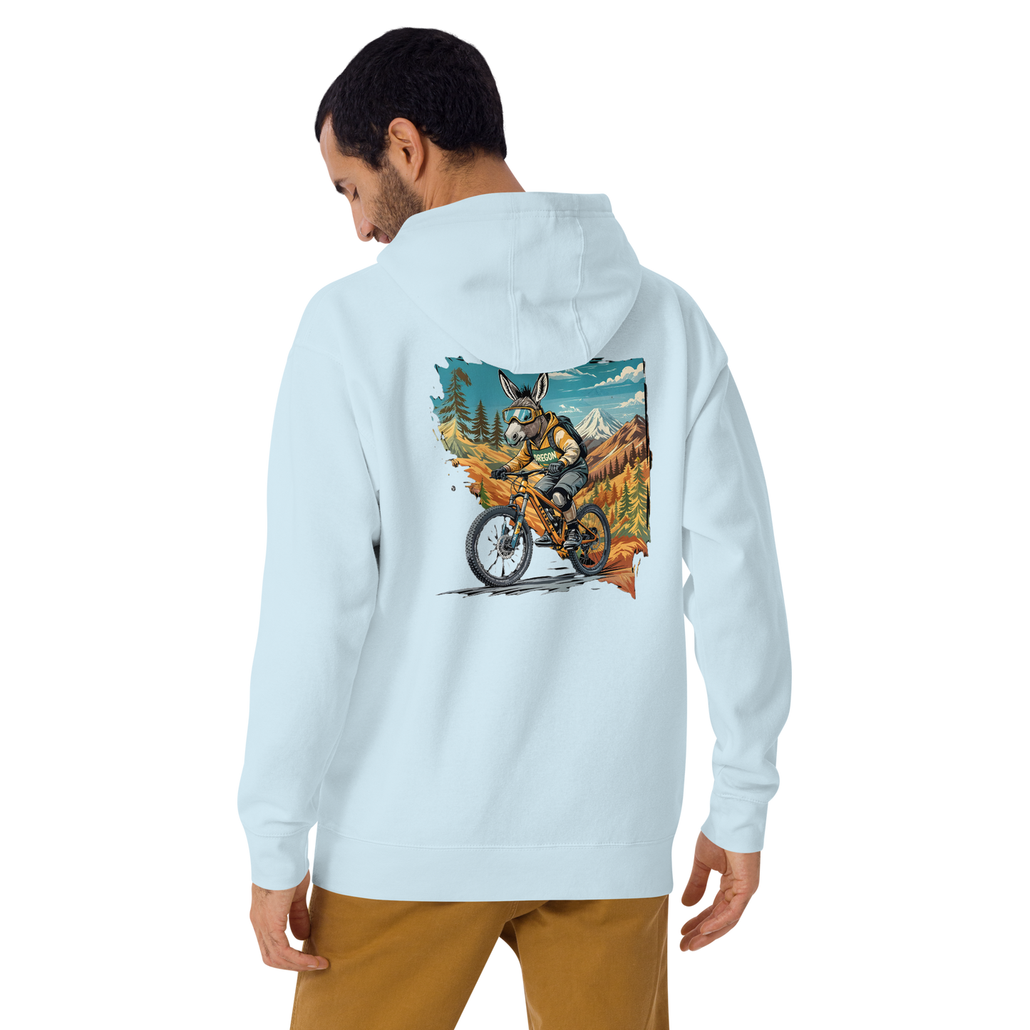 Light blue hoodie with a colorful graphic on the back, worn by a person.