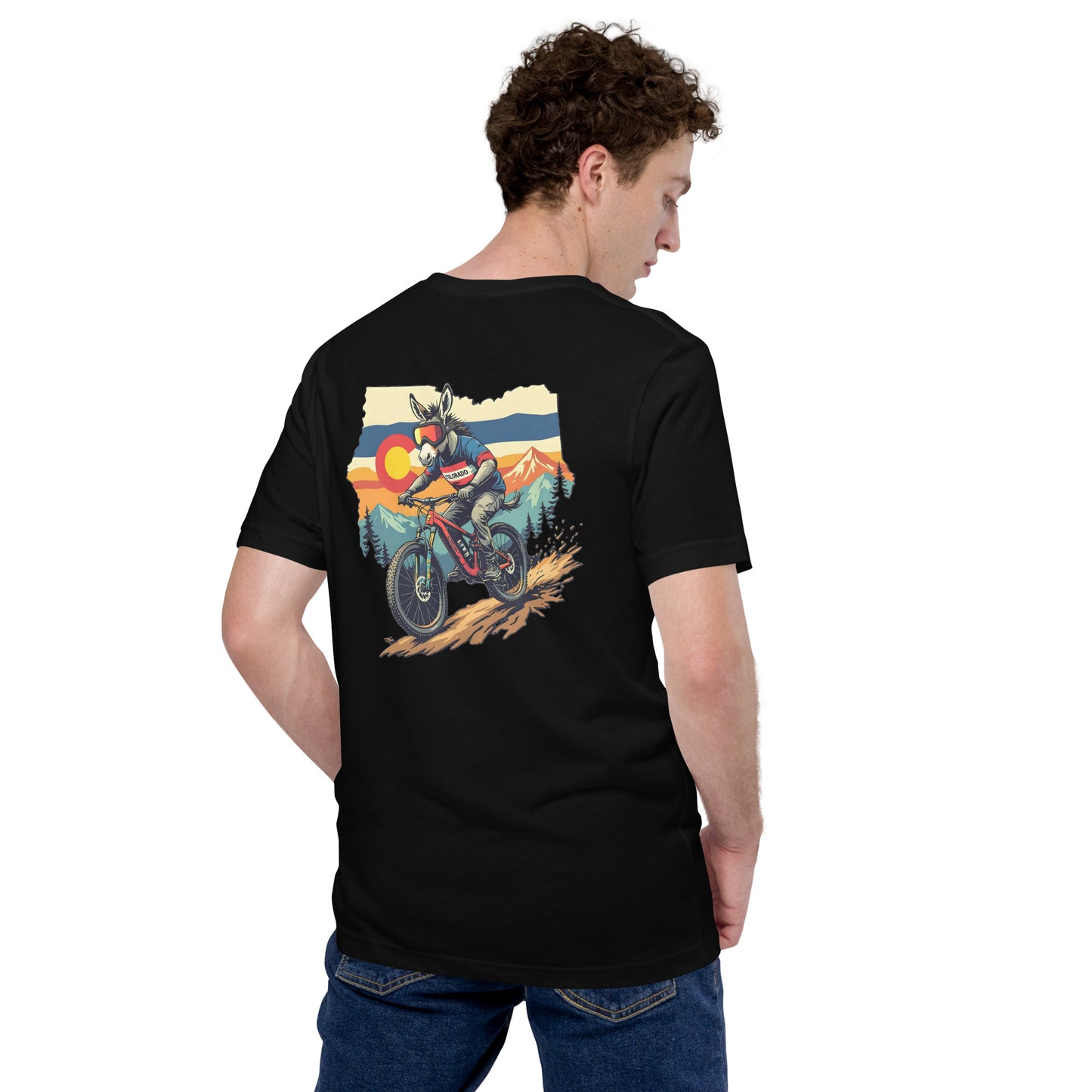 Person wearing a black t-shirt with a colorful graphic on the back, standing against a white background