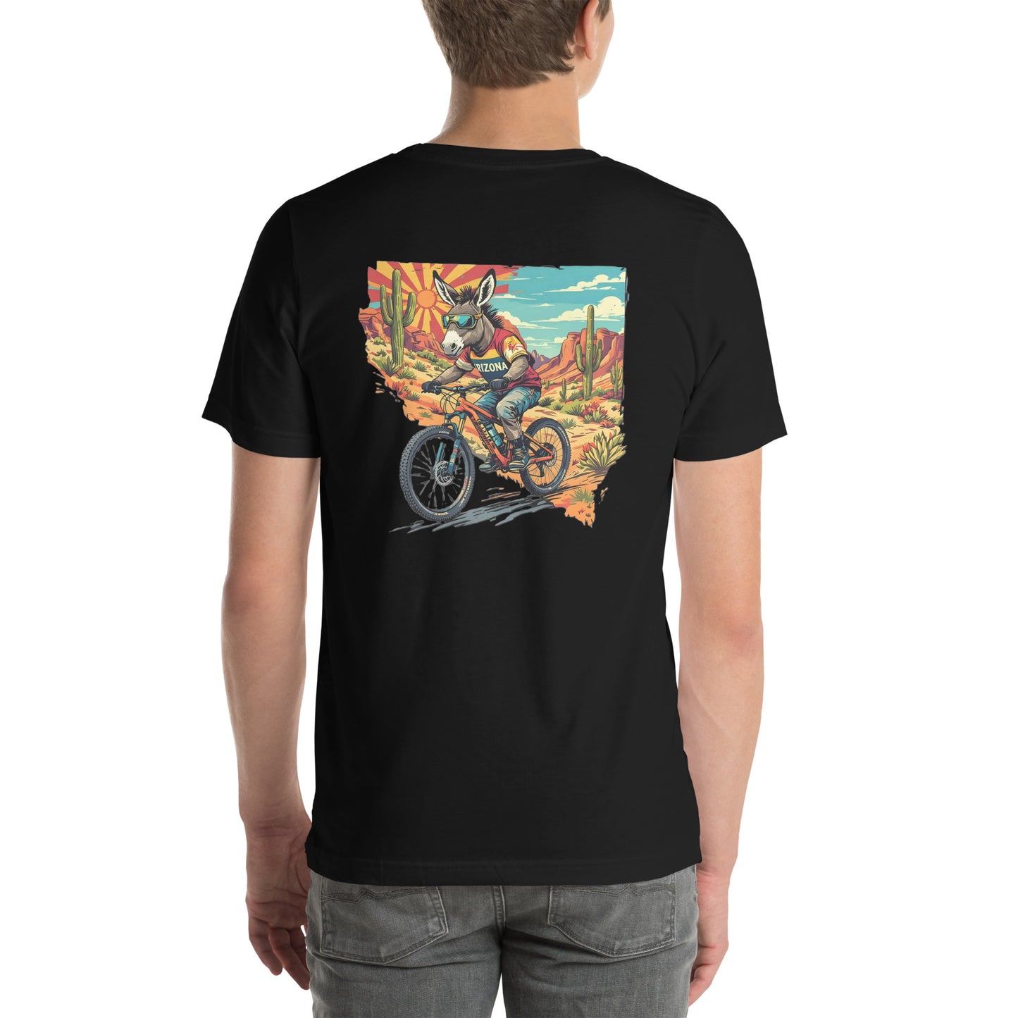Black t-shirt with a colorful graphic of a person riding a bike in a desert landscape on the back.