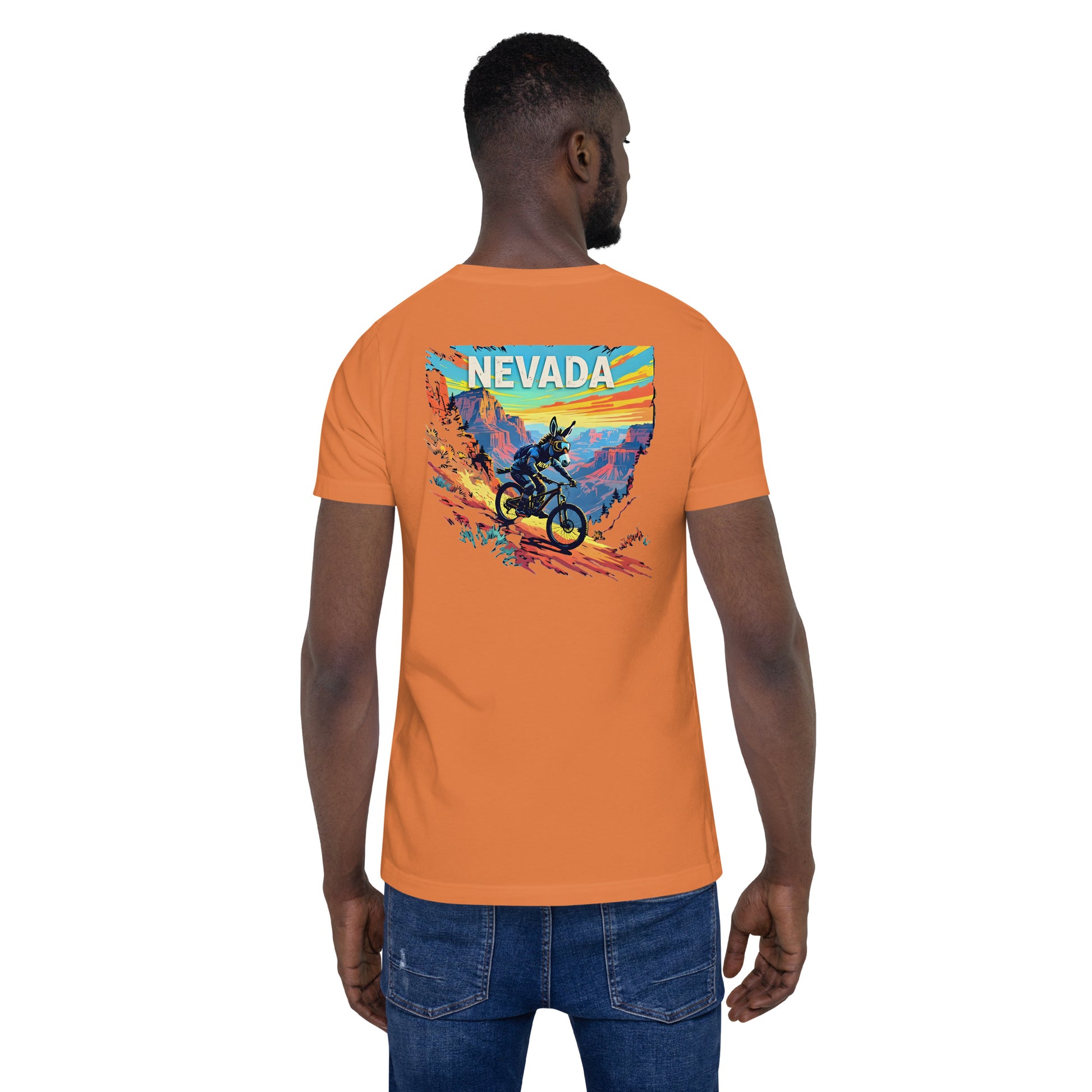Person wearing an orange t-shirt with a graphic design on the back, featuring the word 'Nevada'.