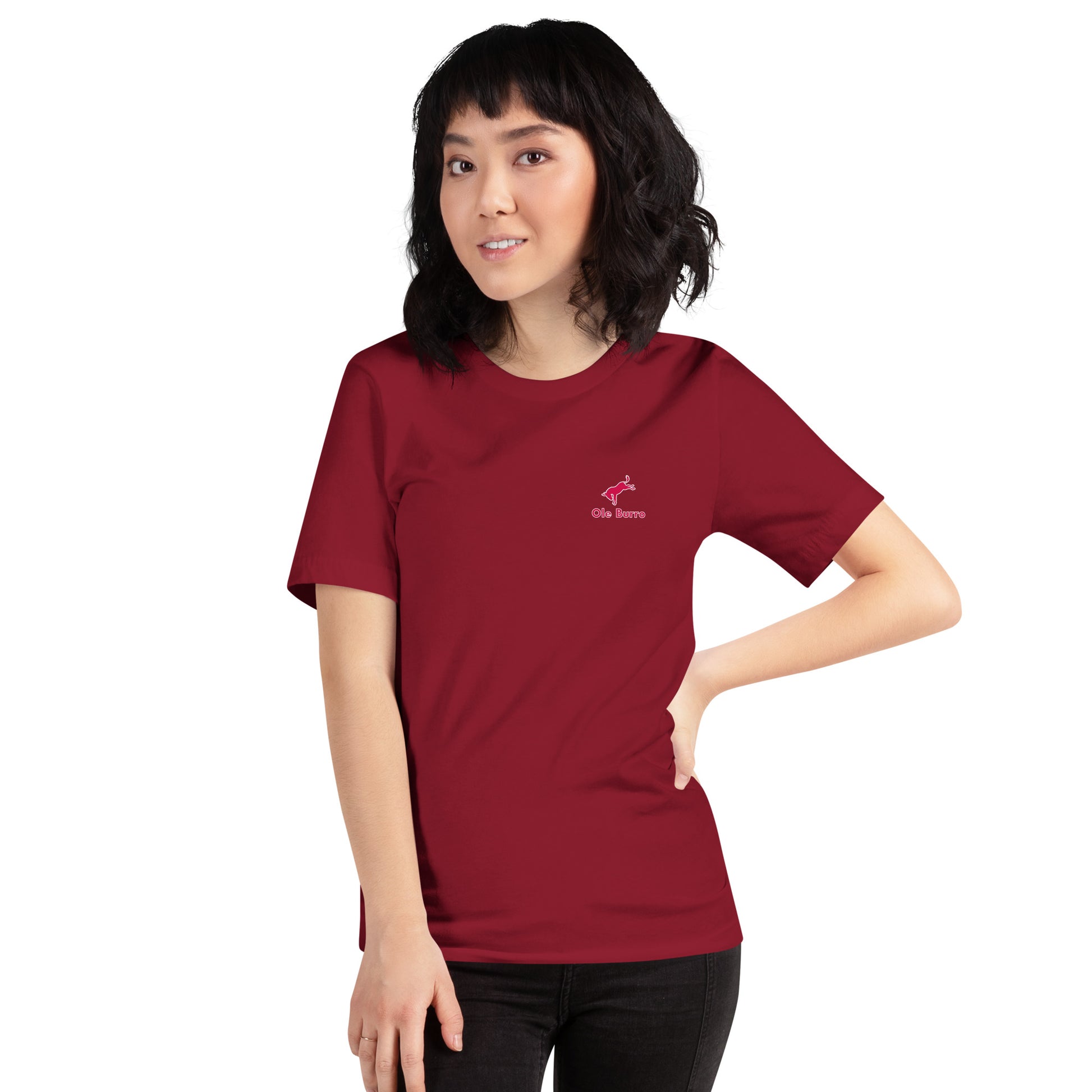 Person wearing a red t-shirt with a logo on a white background