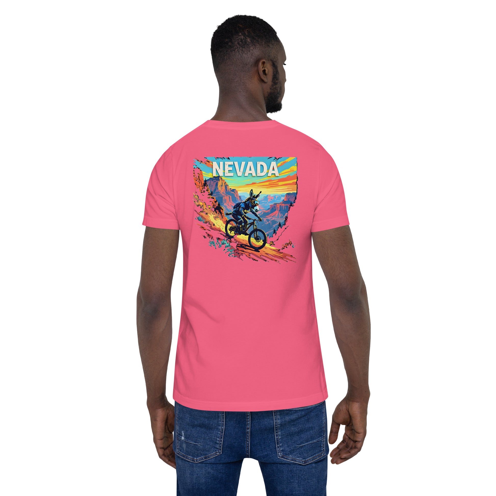 Person wearing a pink t-shirt with a colorful graphic and 'NEVADA' text on the back.