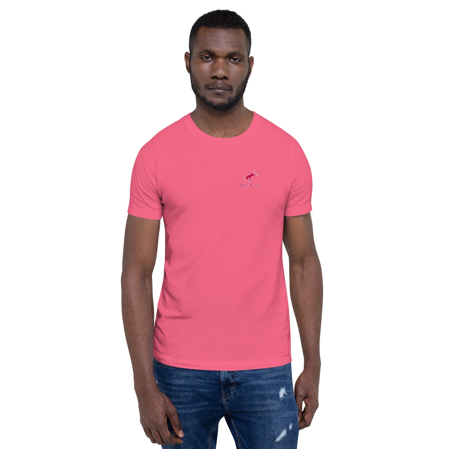Man wearing a pink t-shirt with a small logo on a white background