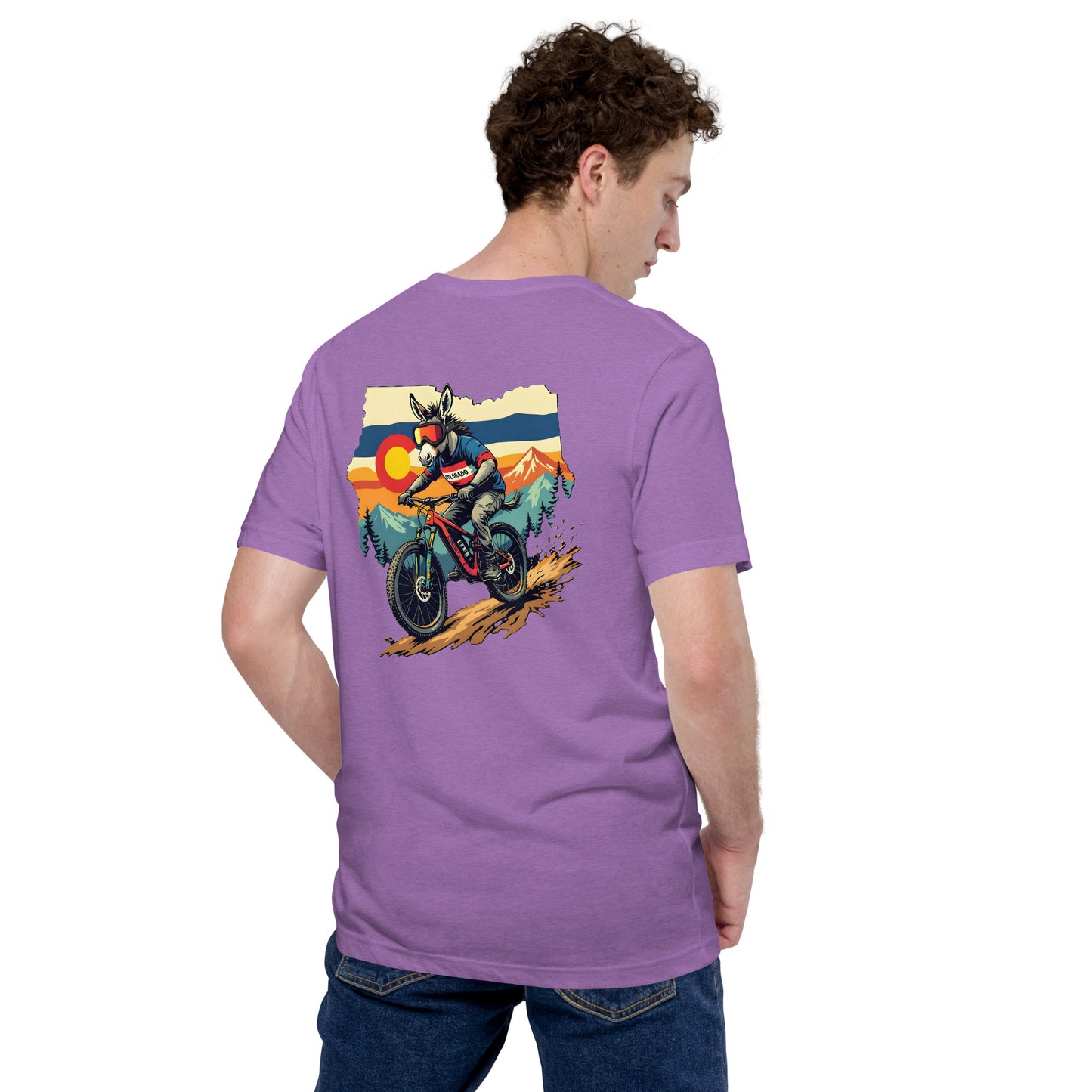 Person wearing a purple t-shirt with a graphic of a motorcycle on the back, standing against a white background.