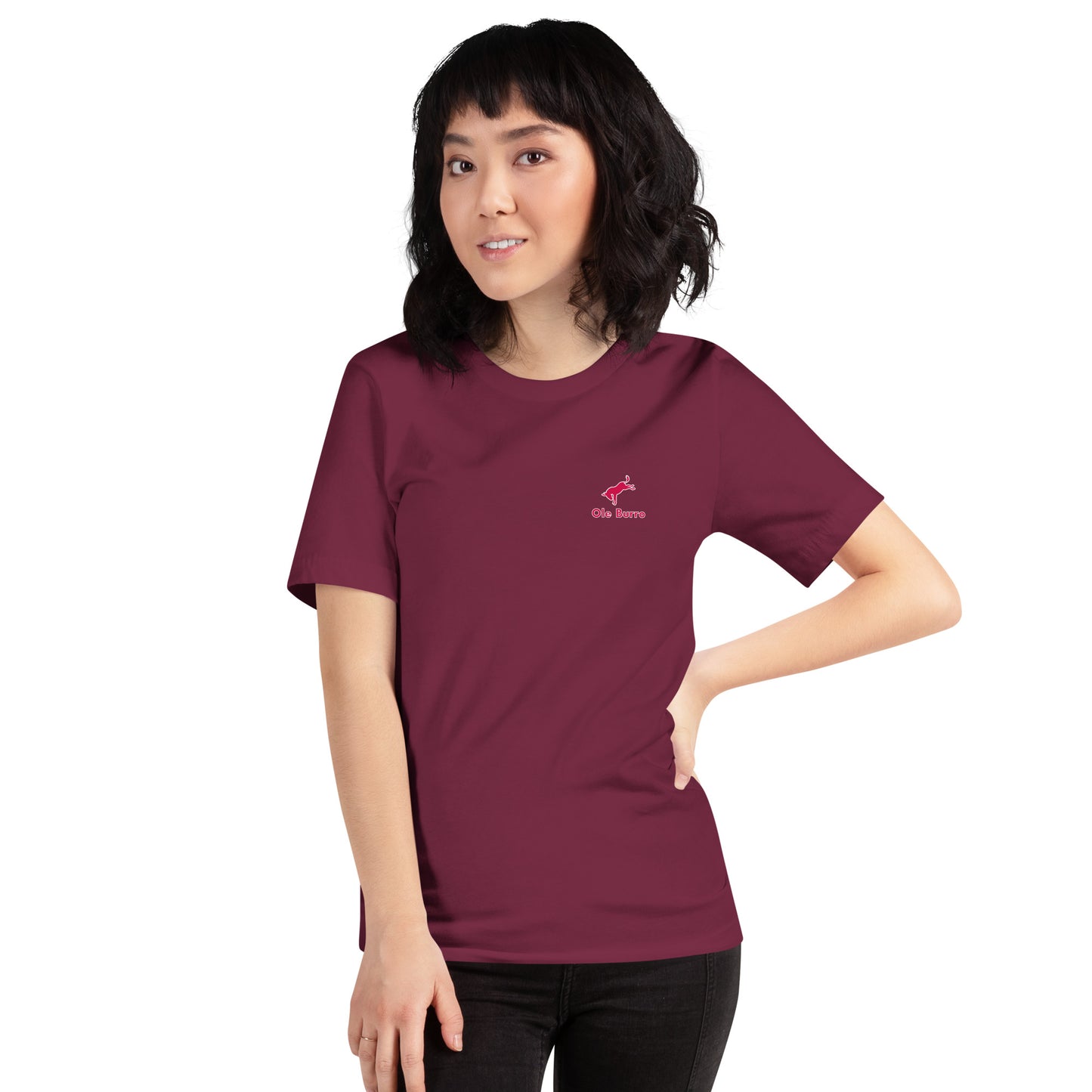 Person wearing a maroon t-shirt with a logo on a white background