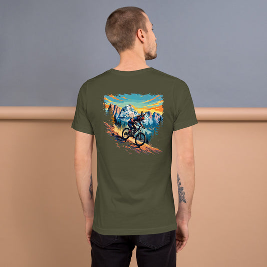 Person wearing a green t-shirt with a mountain bike graphic on the back, standing against a plain background.