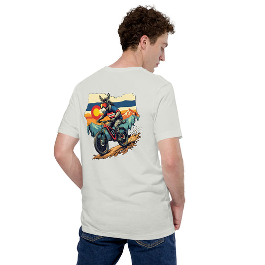 Person wearing a t-shirt with a graphic of a motorcycle on the back, standing against a white background