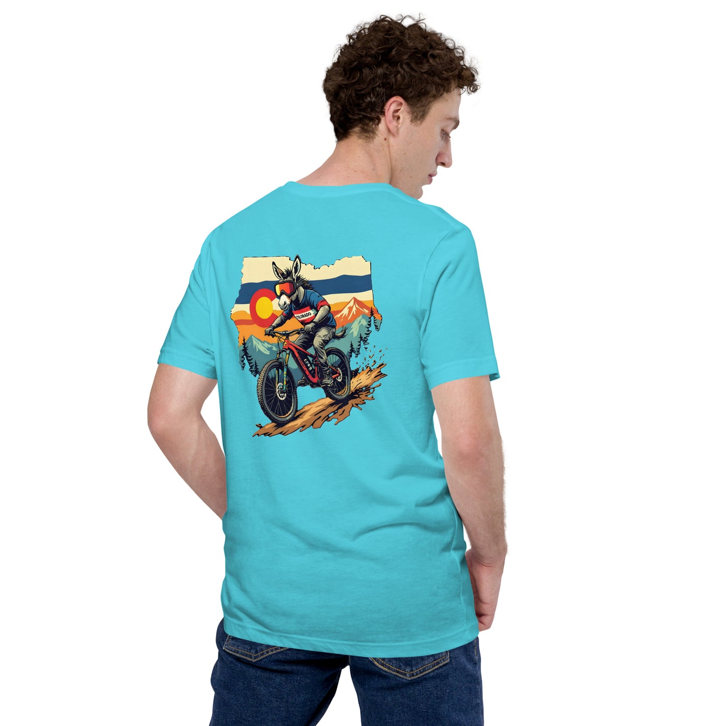 Person wearing a turquoise t-shirt with a graphic of a motorcycle on the back, standing against a white background.
